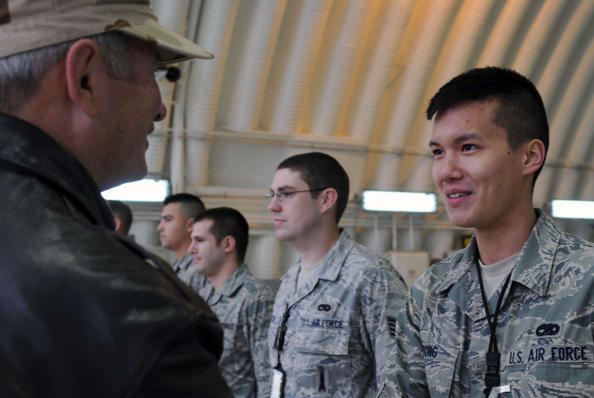 Airman 1st Class Calvin Wong, of the 39th Maintenance Squadron, greets Gen. Duncan J. McNabb, the commander of the U.S. Transportation Command, during his visit Dec. 17, 2010 to Incirlik Air Base, Turkey. During General McNabb’s visit to the 39th Air Base Wing he spoke to Airmen at a commander’s call and visited with members of the 39th MXS, 728th Air Mobility Squadron, 39th Security Forces Squadron and the 90th Expeditionary Air Refueling Squadron.  (U.S. Air Force photo by Senior Airman Sara Csurilla/Released)
