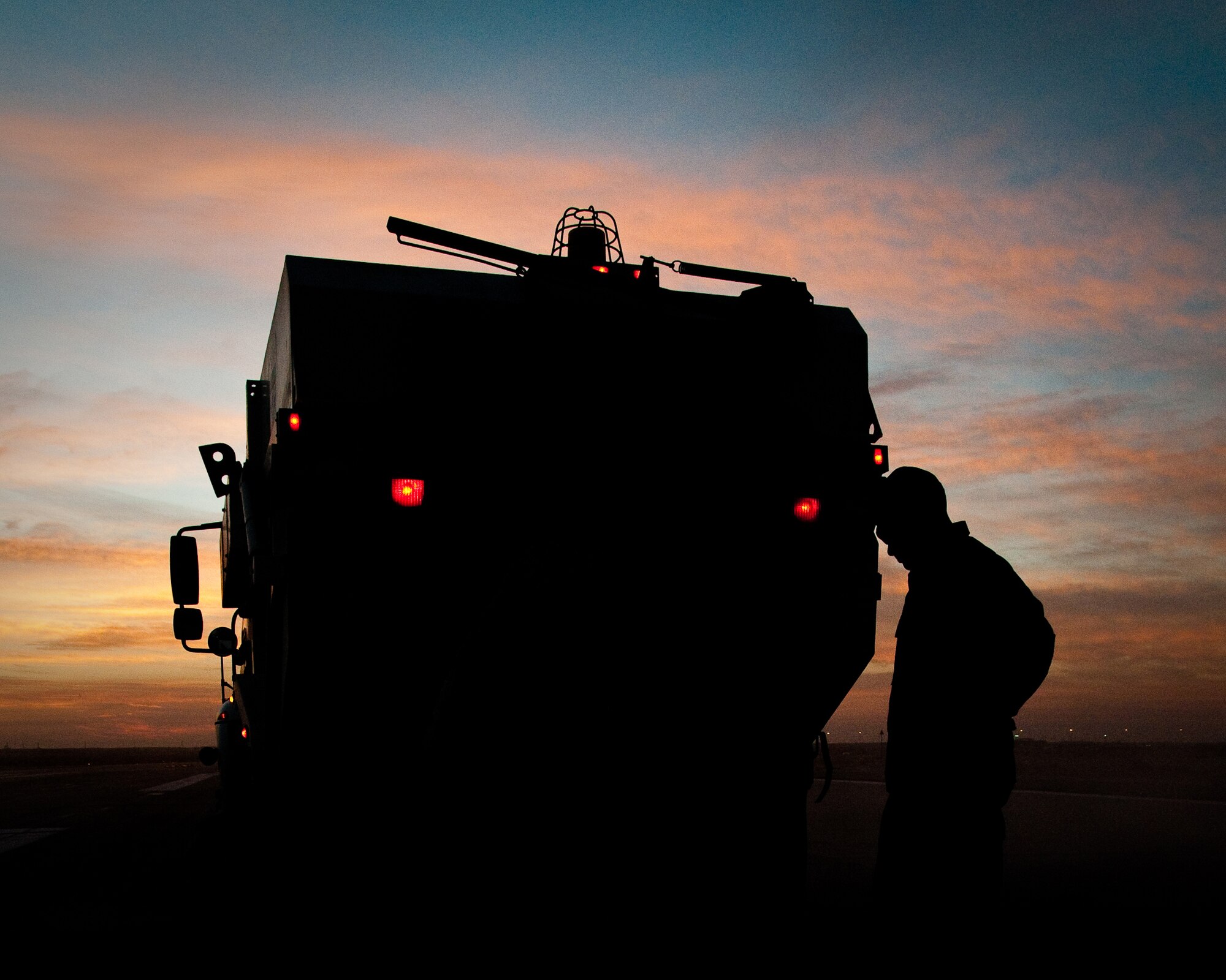 SOUTHWEST ASIA - Senior Airman Jacob Cleer, a heavy equipment operator assigned to the 386th Expeditionary Civil Engineer Squadron, examines cracked pavement Dec. 10, 2010, on a runway at the 386th Air Expeditionary Wing. Airman Cleer is a member of the wing's Runway Repair Team, which patches sections of crumbling concrete weekly. (U.S. Air Force photo by Maj. Dale Greer)