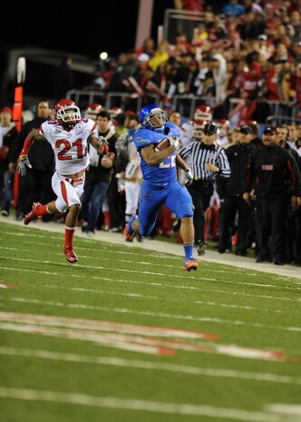 LAS VEGAS -- Doug Martin of the Boise State Broncos outruns Utah's defense for an 84 yard touchdown in the second quarter of the MAACO Las Vegas Bowl at Sam Boyd Stadium Dec. 22. More than 200 Airmen from Nellis and Creech Air Force Bases attended the game after saluting in formation for the opening ceremonies. (U.S. Air Force photo by Airman 1st Class Daniel Hughes/Released)
