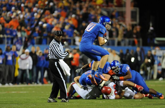 LAS VEGAS --Kyle Efaw of the Boise State Broncos makes a catch in the second quarter of the MAACO Las Vegas Bowl at Sam Boyd Stadium Dec 22. More than 200 Airmen from Nellis and Creech Air Force Bases attended the game after saluting in formation for the opening ceremonies. (U.S. Air Force photo by Airman 1st Class Daniel Hughes/Released)
