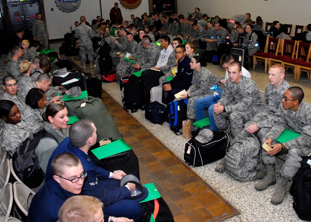 Airmen in Training anxiously wait to board buses and head home for the holidays Dec. 21-22 at the Airman’s Club at Sheppard Air Force Base, Texas. Exodus is planned and coordinated by the 82nd Training Wing training operations office, and is the stronghold for safely moving about 5,000 Airmen in Training home for the holidays each year. (U.S. Air Force photo/Harry Tonemah) 
