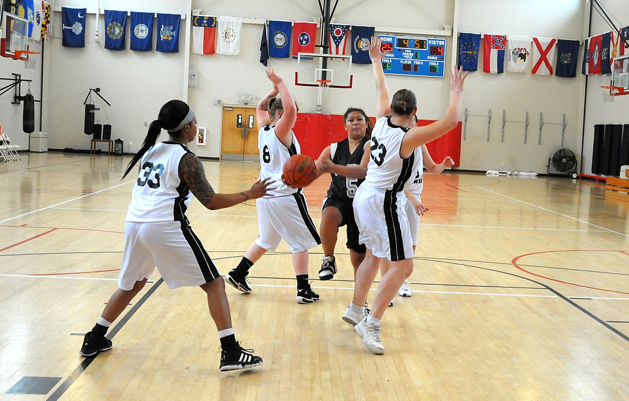 LAAFB Storm player, Crisselle La Csina, goes in for a layup during a game against the Vandenberg’s Lady Hawks Dec. 18, 2010.  The Storm reigned the court in a 53-22 win.  (Photo by Joe Juarez)