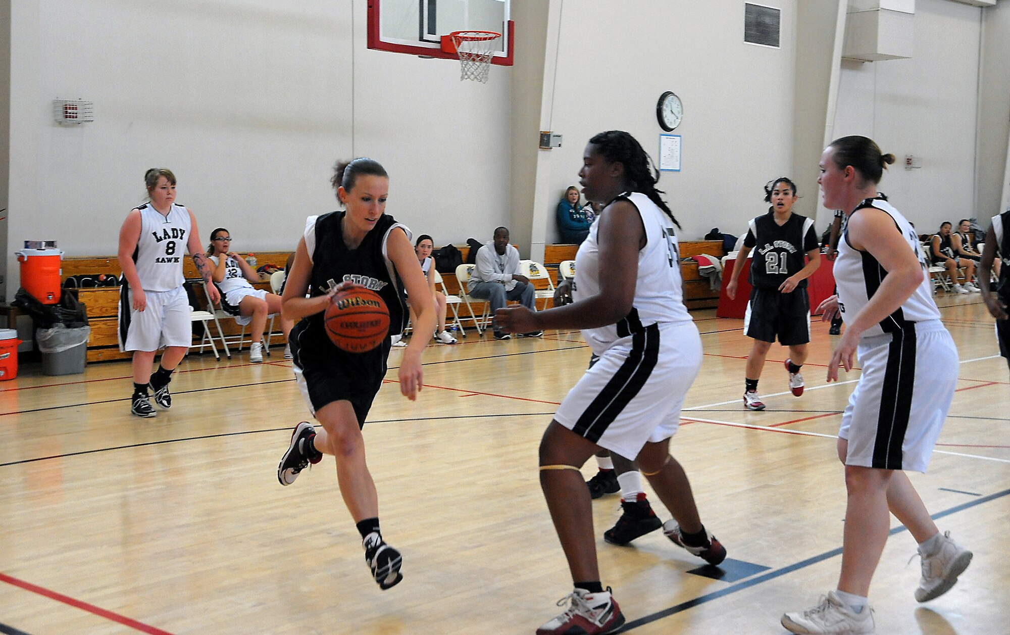 LAAFB Storm player, Candy Cleverly, drives for layup during a game against the  Vandenberg’s Lady Hawks Dec. 18, 2010.  The Storm reigned the court in a 53-22 win.  (Photo by Joe Juarez)
