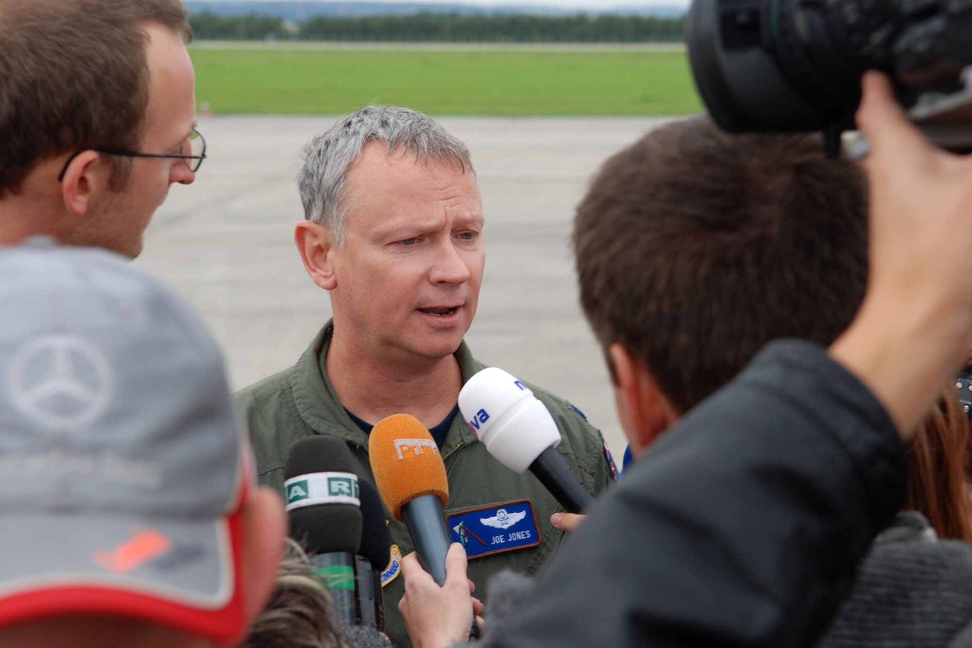 Lt. Col. Joseph “Doc” Jones, commander, 93rd Bomb Squadron, speaks with local media during the 10th Annual NATO Days in Ostrava air show, Ostrava, Czech Republic, Sept. 18, 2010. Colonel Jones became part of history as part of the crew who landed a B-52H Stratofortress at the Leoš Janácek Airport in support of the air show on Sept. 15, 2010. The air show is the largest air, army and security show in Central Europe. This marked the first-time ever a B-52 bomber has visited the Czech Republic. The 93rd BS is assigned to the 917th Wing at Barksdale Air Force Base, La. (U.S. Air Force photo/Master Sgt. Greg Steele) 