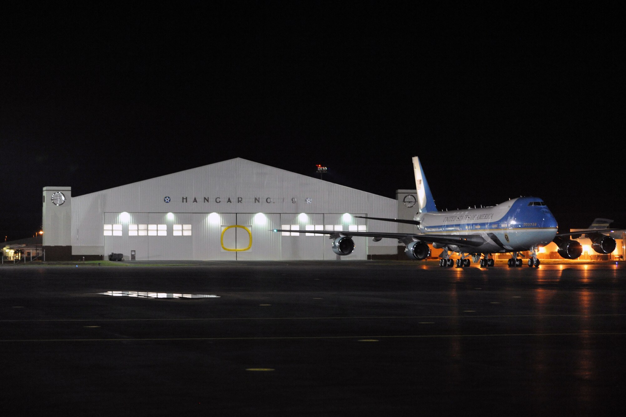 Air Force One taxis toward the 15th Wing distinguished visitor parking ramp, Joint Base Pearl Harbor-Hickam, Hawaii Dec. 22. General Gary North, Pacific Air Forces commander, Col. Sam Barrett, 15th Wing commander and Capt. Tyisha Owens, PACAF Protocol officer, greeted the President upon arrival. The President and his family are expected to stay in Hawaii through the new year. (U.S. Air Force photo/Staff Sgt. Nathan Allen)