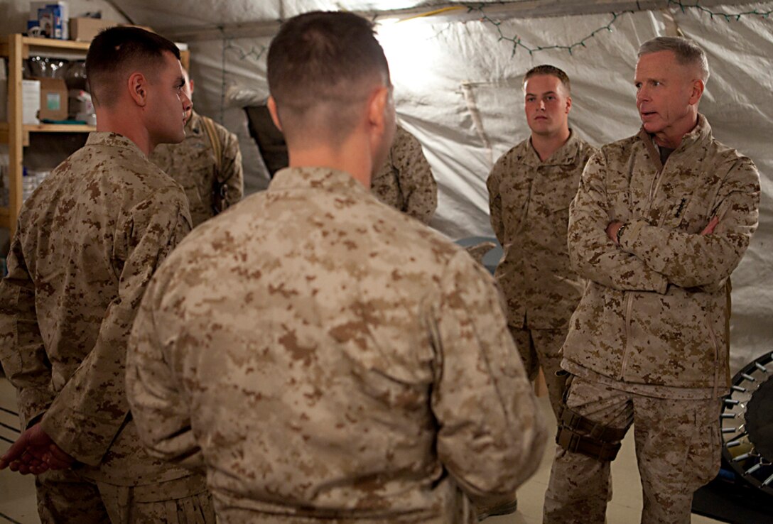 Commandant of the Marine Corps, Gen. James F. Amos speaks with Sailors and Marines of the Concussion Restoration Care Center at Camp Leatherneck,  Afghanistan on Dec. 23.  The CRCC is the first-of-its-kind clinic that uses a multi-disciplinary approach to treating Afghanistan's number one battle injury, concussions.