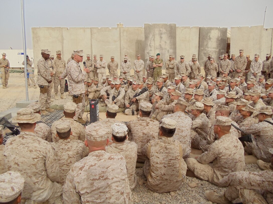 Commandant of the Marine Corps, Gen. James F. Amos visits with the Marines of Regimental Combat Team 2, at Delaram, Afghanistan, Dec. 25, 2010, to thank them for their service and wish them happy holidays.