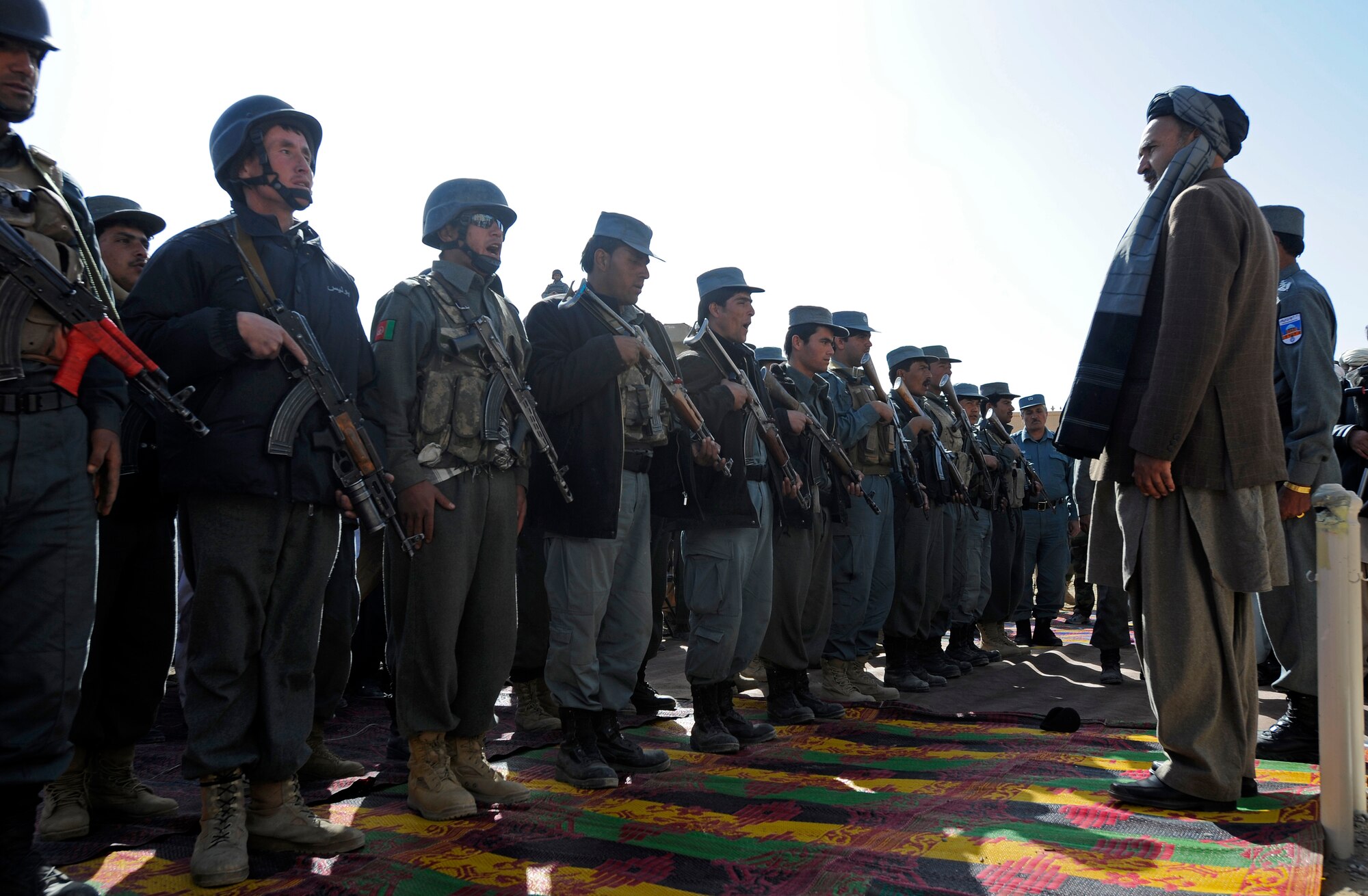 Zabul Provincial Gov. Ashraf Naseri speaks to a group of Afghan National Police officers during the opening of the Shajoy District Center, Dec. 23. Provincial leaders were on hand to open the district center and speak to the more than 90 local villagers in attendance. (U.S. Air Force photo/Staff Sgt. Brian Ferguson) (Released).