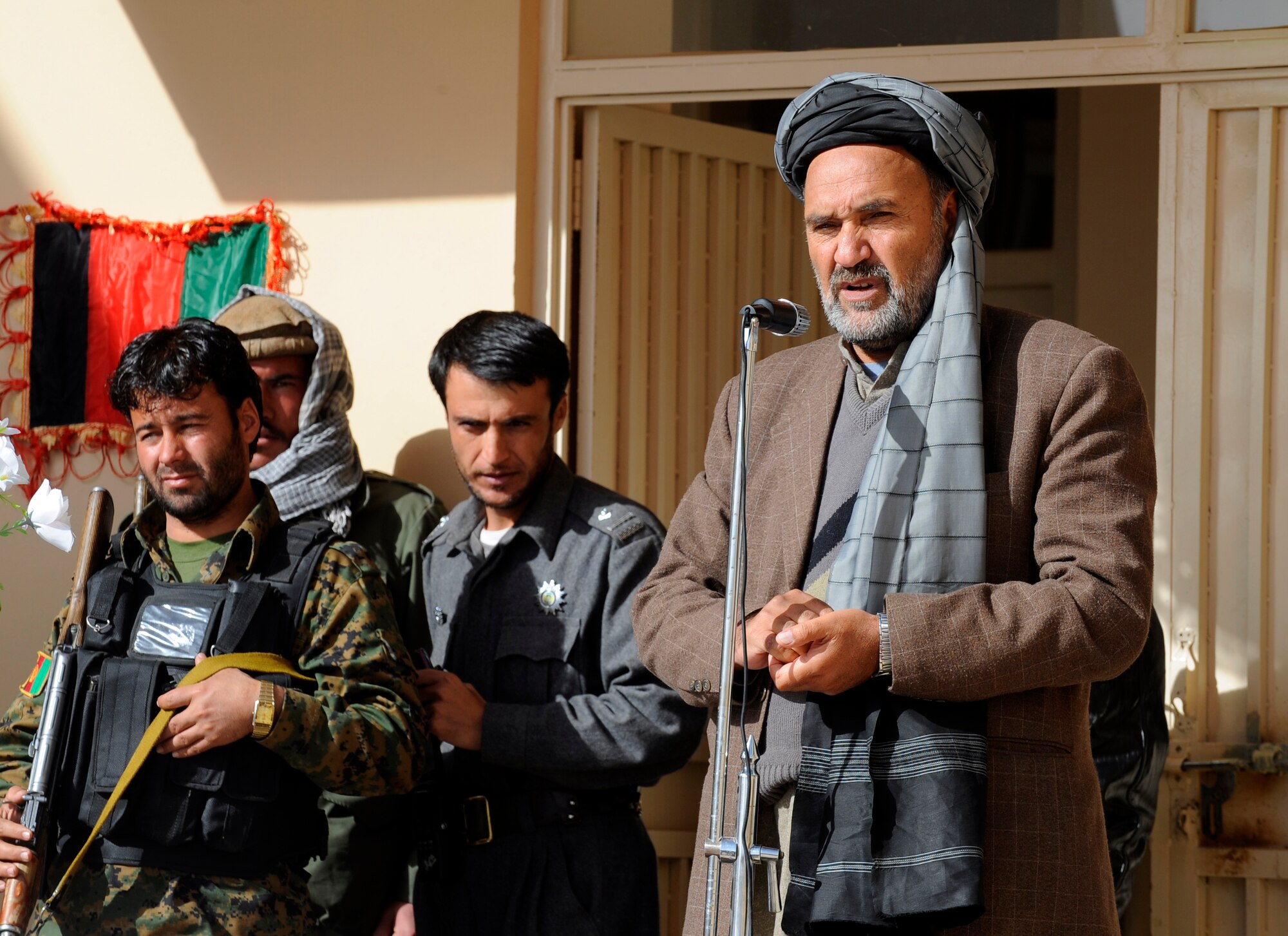 Zabul Provincial Gov. Ashraf Naseri speaks during the opening of the Shajoy District Center, Dec. 23. Provincial leaders were on hand to open the district center and speak to the more than 90 local villagers in attendance. (U.S. Air Force photo/Staff Sgt. Brian Ferguson) (Released).