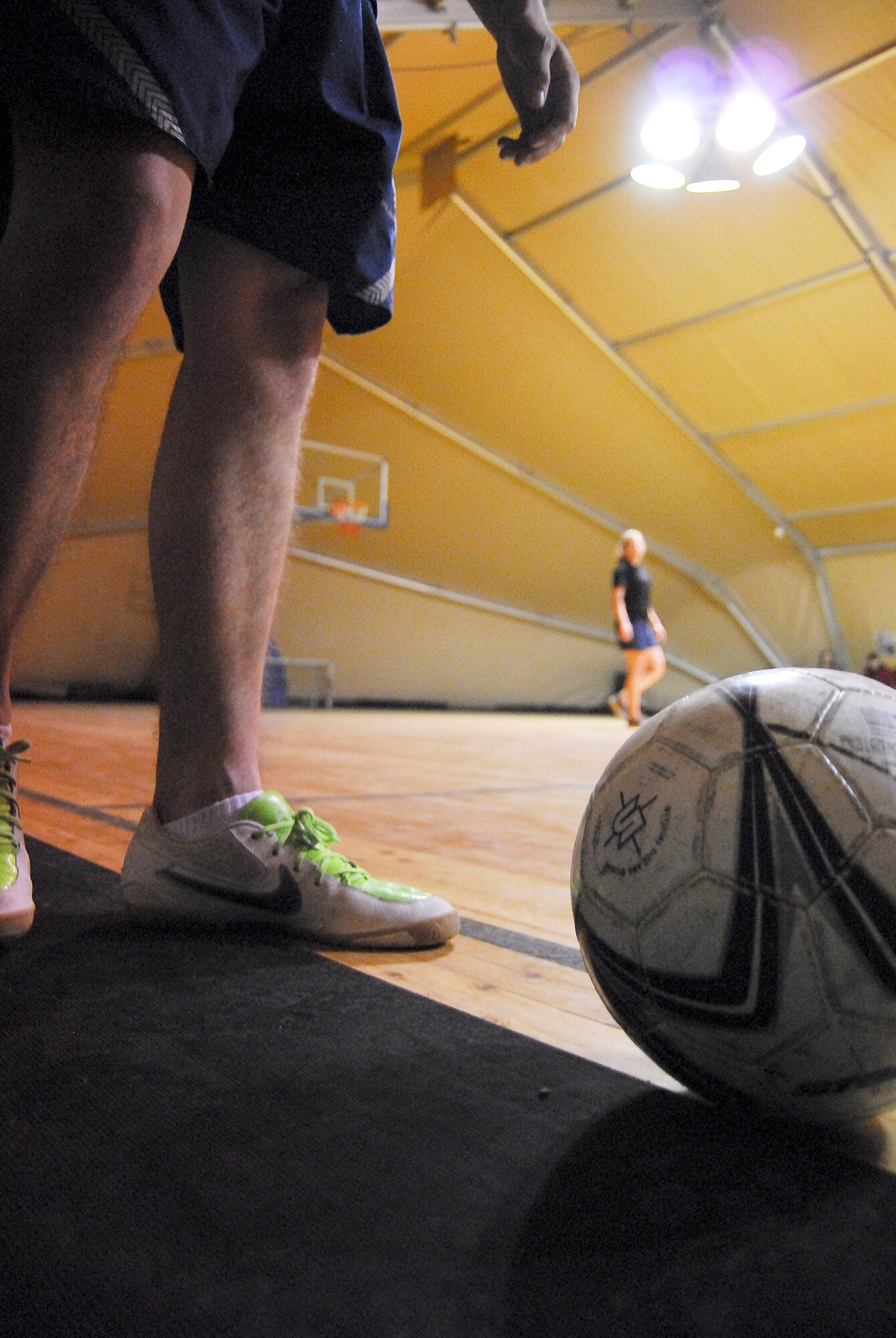 TRANSIT CENTER AT MANAS, Kyrgyzstan - A Transit Center player prepares to kick the ball inbounds during a friendly game of soccer between members of the Kyrgyz Soccer Federation and the Transit Center at Manas.  This game was part of an ongoing series of sports competitions designed to foster relationships between Kyrgyzstan and the U.S.  The Kyrgyz Federation won the game 6-4.  (U.S. Air Force photo/Maj. John Elolf)