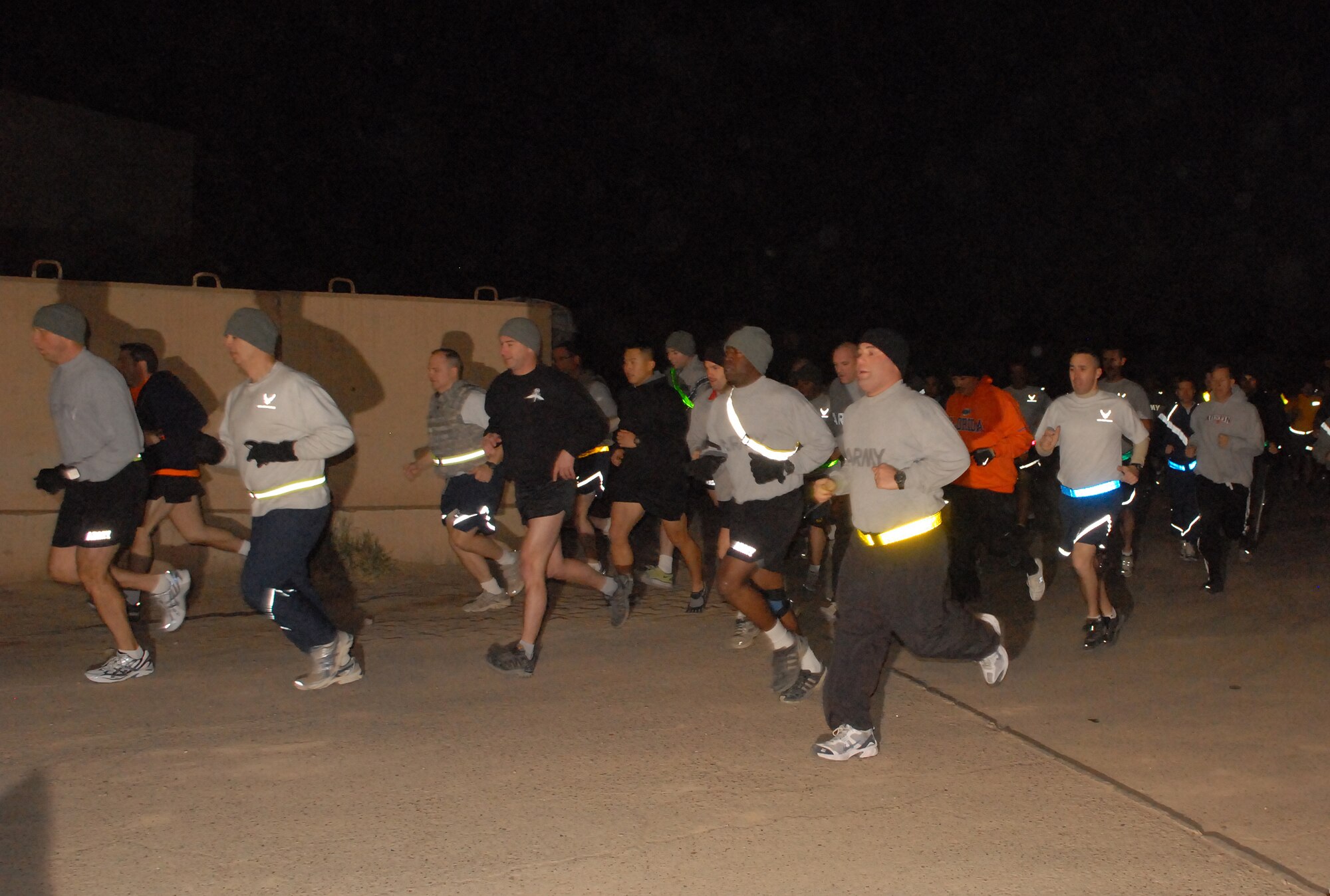 JOINT BASE BALAD, Iraq -- More than 400 servicemembers braved the cold to participate in the Jingle Bell 5K run Christmas morning. The event was sponsored by the 332nd Expeditionary Force Support Squadron and the first 350 runners to finish received a t-shirt.  (U.S. Air Force photo/ Senior Airman Tong Duong)