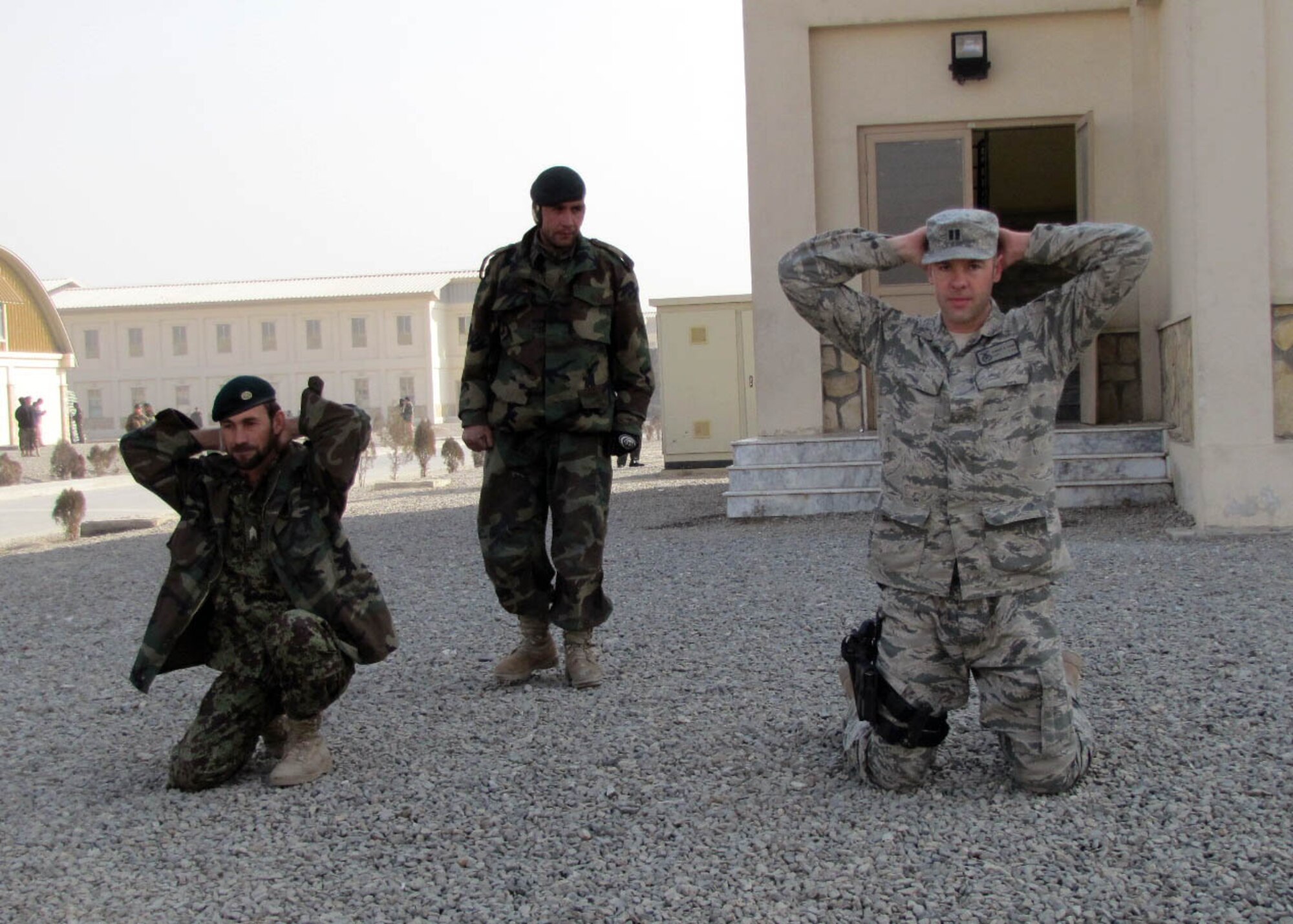 101225-N-6541W-023 KABUL, Afghanistan - Members of the Afghan Air Force and members of the 438th Air Expeditionary Advisory Squadron Security Forces advisors conducted an AAF Security Kandak exercise at the Afghan Air Force Base in Kabul, Afghanistan.  (U.S. Navy photo by Mass Communication Specialist 3rd Class Jared Walker/ RELEASED).