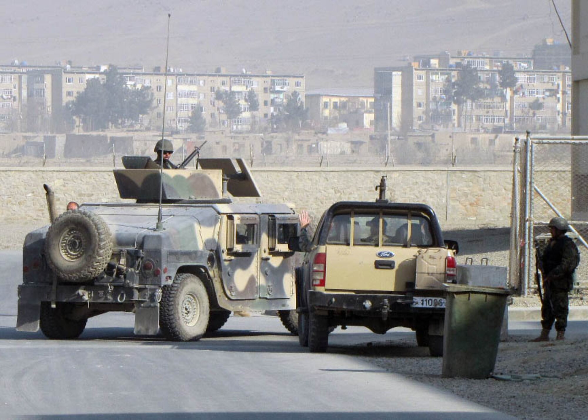 101225-N-6541W-009 KABUL, Afghanistan - Members of the Afghan Air Force and members of the 438th Air Expeditionary Advisory Squadron Security Forces advisors conducted an AAF Security Kandak exercise at the Afghan Air Force Base in Kabul, Afghanistan.  (U.S. Navy photo by Mass Communication Specialist 3rd Class Jared Walker/ RELEASED).