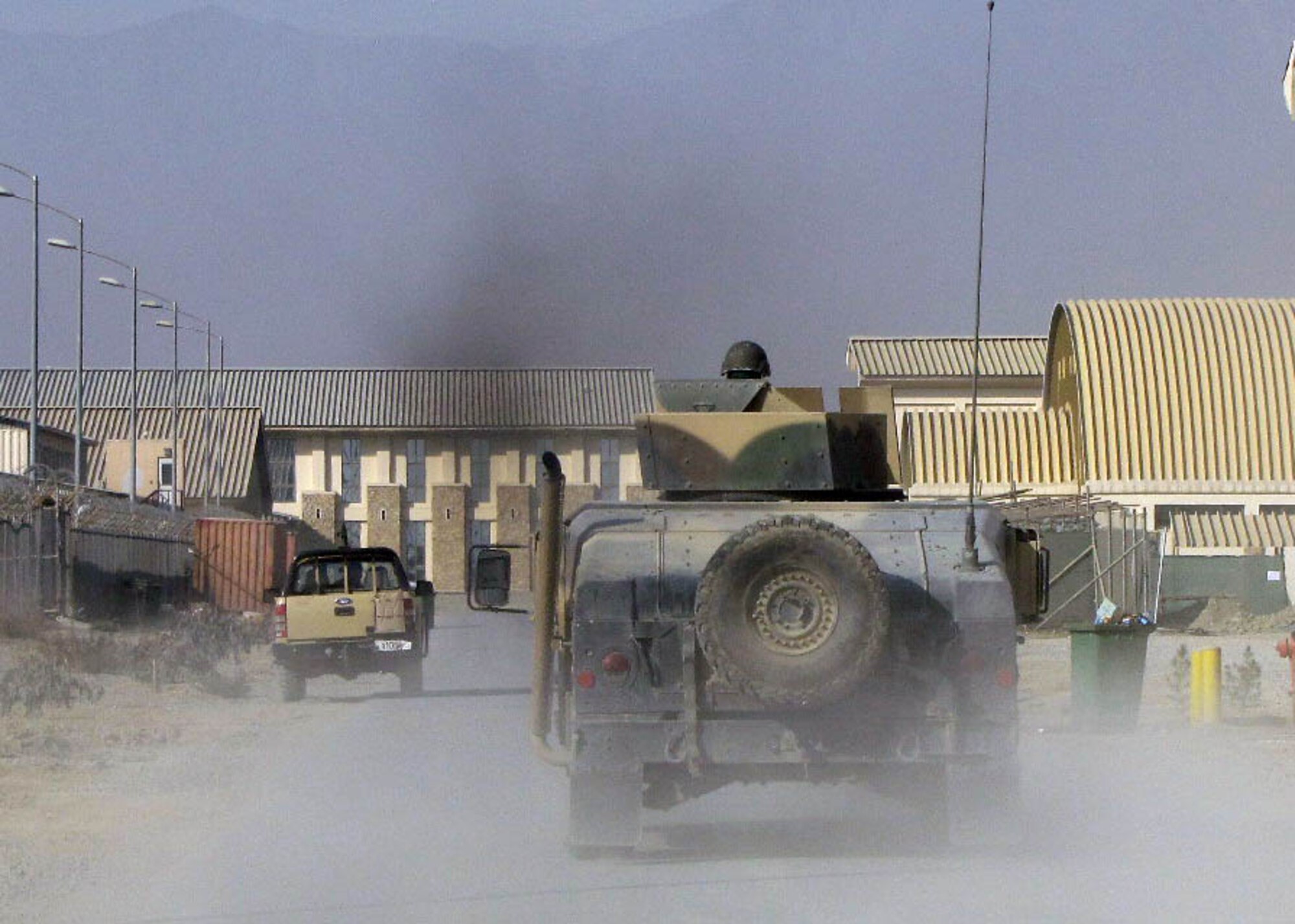 101225-N-6541W-008 KABUL, Afghanistan - Members of the Afghan Air Force and members of the 438th Air Expeditionary Advisory Squadron Security Forces advisors conducted an AAF Security Kandak exercise at the Afghan Air Force Base in Kabul, Afghanistan.  (U.S. Navy photo by Mass Communication Specialist 3rd Class Jared Walker/ RELEASED).