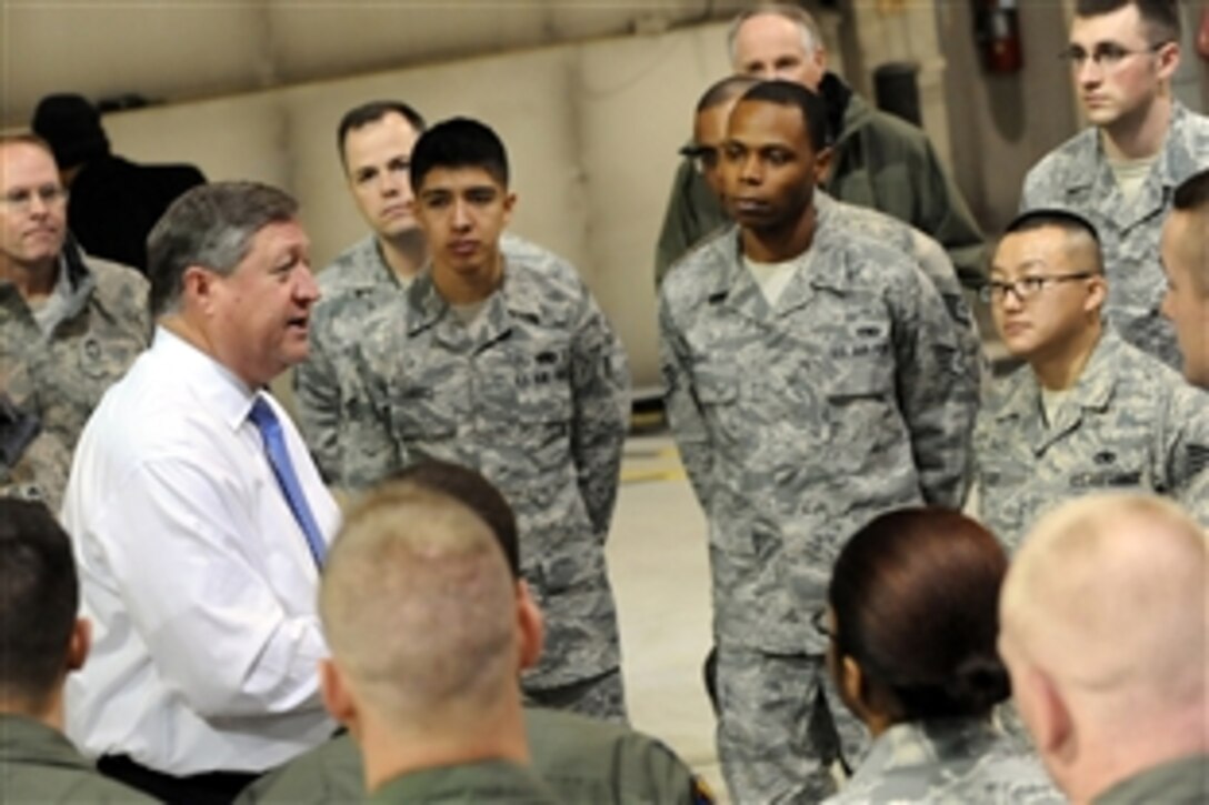 Secretary of the Air Force Michael Donley addresses Airmen from the 5th Bomb Wing at Minot Air Force Base, N.D., about the importance of their mission and thanks the group for their service, Dec. 23, 2010. Donely conducted the holiday visit to the base Dec. 23 and 24, 2010, and met with airmen and civilians at workcenters and facilities there, who proudly showcased the Air Force's only dual-mission bomber and ICBM base. 