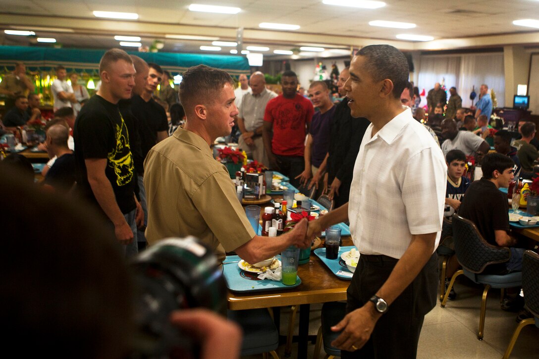President of the United States Barack Obama shakes the hand of a Marine second lieutenant at Anderson Hall aboard Marine Corps Base Hawaii Kaneohe Bay Dec. 25, 2010. "Having the President visit is a great opportunity for the Marines and sailors to meet our commander in chief and it's an honor to host his visit," said Col. Robert Rice, base commander, MCB Hawaii.