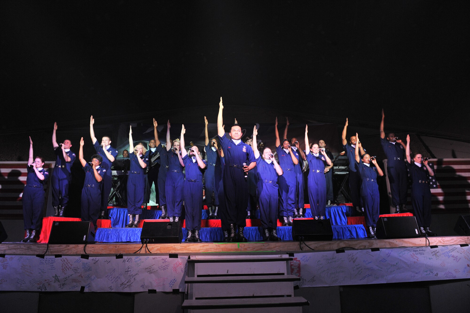 Members of Tops in Blue perform at Bagram Airfield, Afghanistan, Dec. 24, 2010. This year’s theme for the group of expeditionary entertainers was “We Believe.” (DoD photo by U.S. Air Force Senior Airman Sheila deVera/RELEASED)