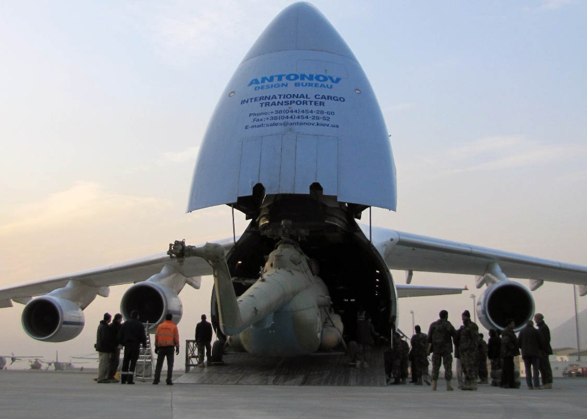 KABUL, Afghanistan - An Afghan Air Force Mi-17 transport aircraft being towed so it can be loaded onto an An-124 at the Afghan Air Force Base in Kabul, Afghanistan Dec.26. The Afghan Air Force does not have the capability yet to overhaul the aircraft so the aircraft will be shipped to the contractors facility. (U.S. Navy photo by Mass Communications Specialist Third Class Petty Officer Jared E. Walker/ RELEASED).