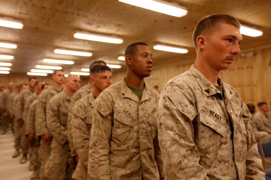 More than 150 service members pay their final respects to Sgt. Jason T. Smith and Gunnery Sgt. Justin E. Schmalstieg during a memorial service at Camp Leatherneck, Afghanistan, Dec. 26. Smith and Schmalstieg, assigned to 1st Explosive Ordnance Disposal Company, 1st Marine Logistics Group (Forward), were killed in action Nov. 19 and Dec. 15, respectively, while conducting combat operations in Helmand province, Afghanistan.