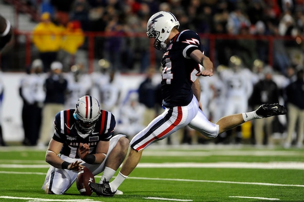 Air Force kicker Zack Bell kicks a 41-yard field goal to give the Falcons their first points of the game in the Advocare V100 Independence Bowl against Georgia Tech Dec. 27, 2010. Bell, a native of Darien, Ill., hit field goals from 41 and 42 yards in the first half, paving the way for a 14-7 Air Force victory. (U.S. Air Force photo/Mike Kaplan)
