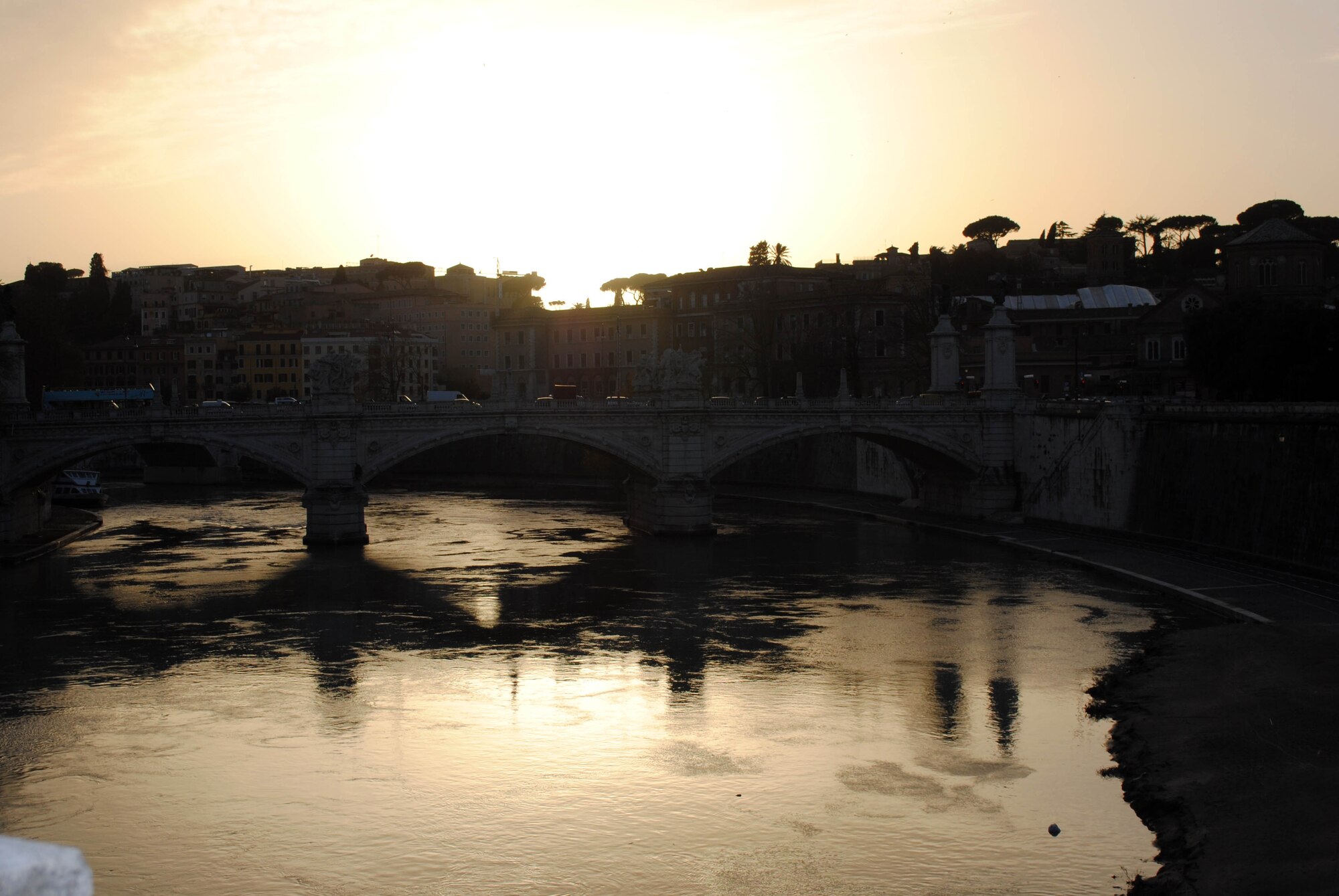 SPANGDAHLEM AIR BASE, Germany – The sun sets behind the Vitorio Emanuele II Bridge, one of about 30, in Rome Dec. 23.  This bridge opened in 1911 and was built to commemorate Vitorio Emanuele II, the first king of a united Italy.  Twenty-six service members and civilians booked a trip to Rome Dec. 21 – 25 with the 52nd Force Support Squadron’s Information, Tickets and Travel office. (USAF photo/Master Sgt. Kelley J. Stewart)