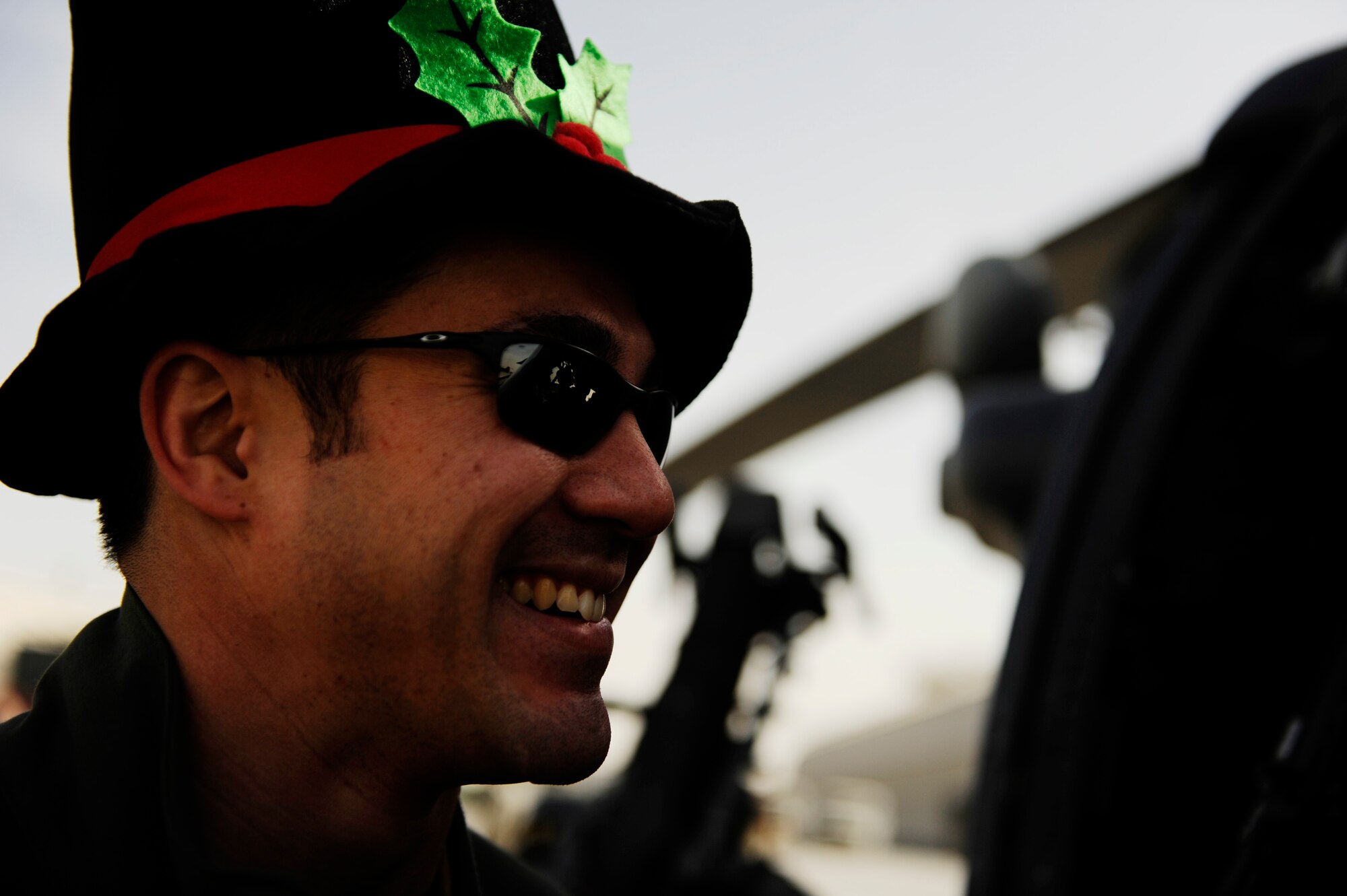 U.S. Air Force Capt. David Fink, 26th Expeditionary Rescue Squadron, conducts pre-flight checks on an HH-60 Pave Hawk in order to be ready for a mission at a moment's notice at Kandahar Airfield, Afghanistan, Dec. 25, 2010. The rescue squadrons are on alert 24/7 including holidays like Christmas. (U.S. Air Force photo by SSgt. Eric Harris, U.S. Air Forces Central Public Affairs / Released.)