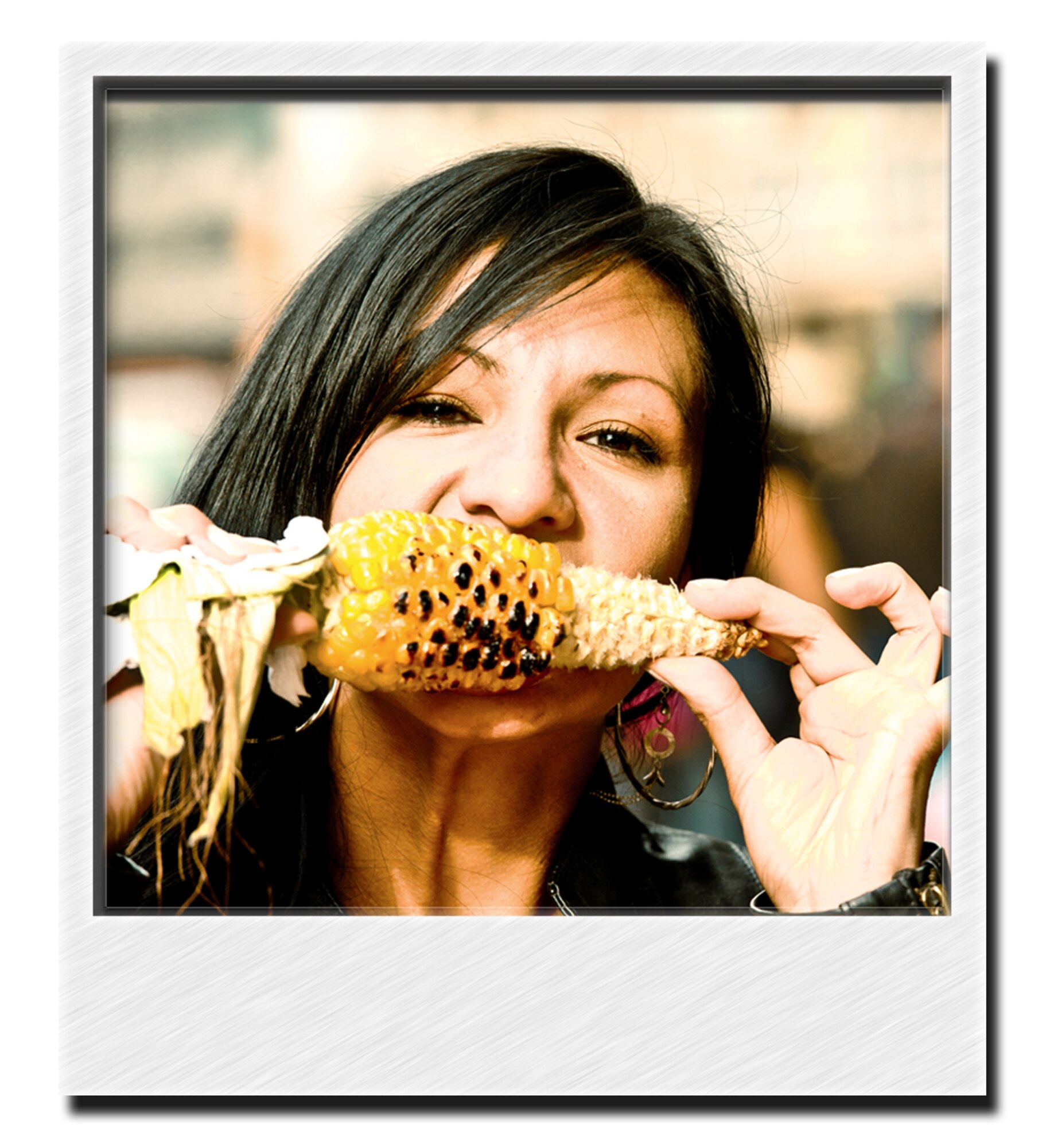 Traveling Abroad - A local enjoys roasted corn on the cob from a street vendor.
(Photo by TSgt Samuel Bendet)