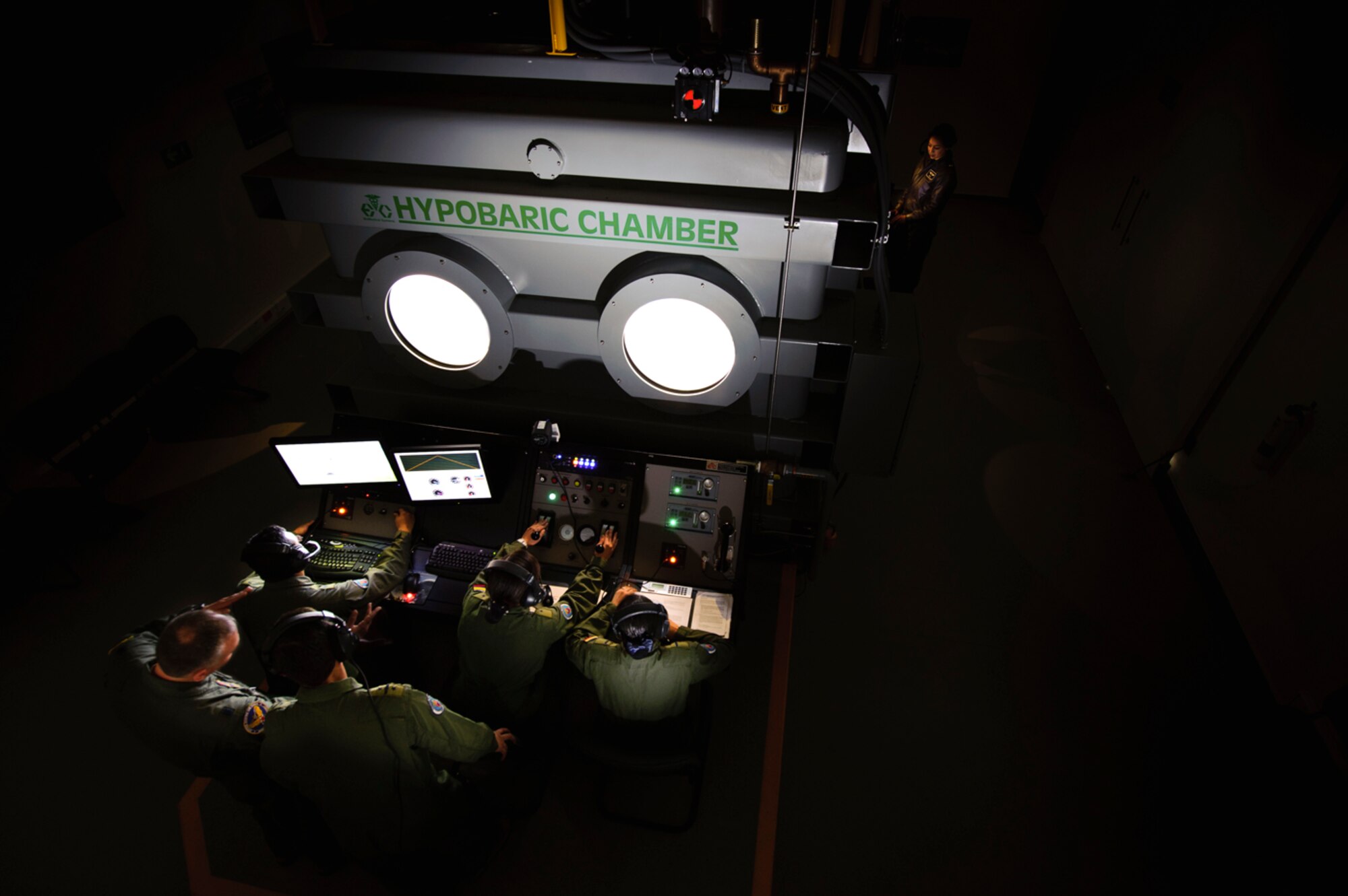 The Colombian Air Force recently built and altitude chamber for thier aircrew.. It is now in operation. Members of the physioloical team from AETC are here to make sure the Colombians prrogram meet US Air Force  requirements, therefore allowing neighboring nations to train here.
(Photo by TSgt Samuel Bendet)