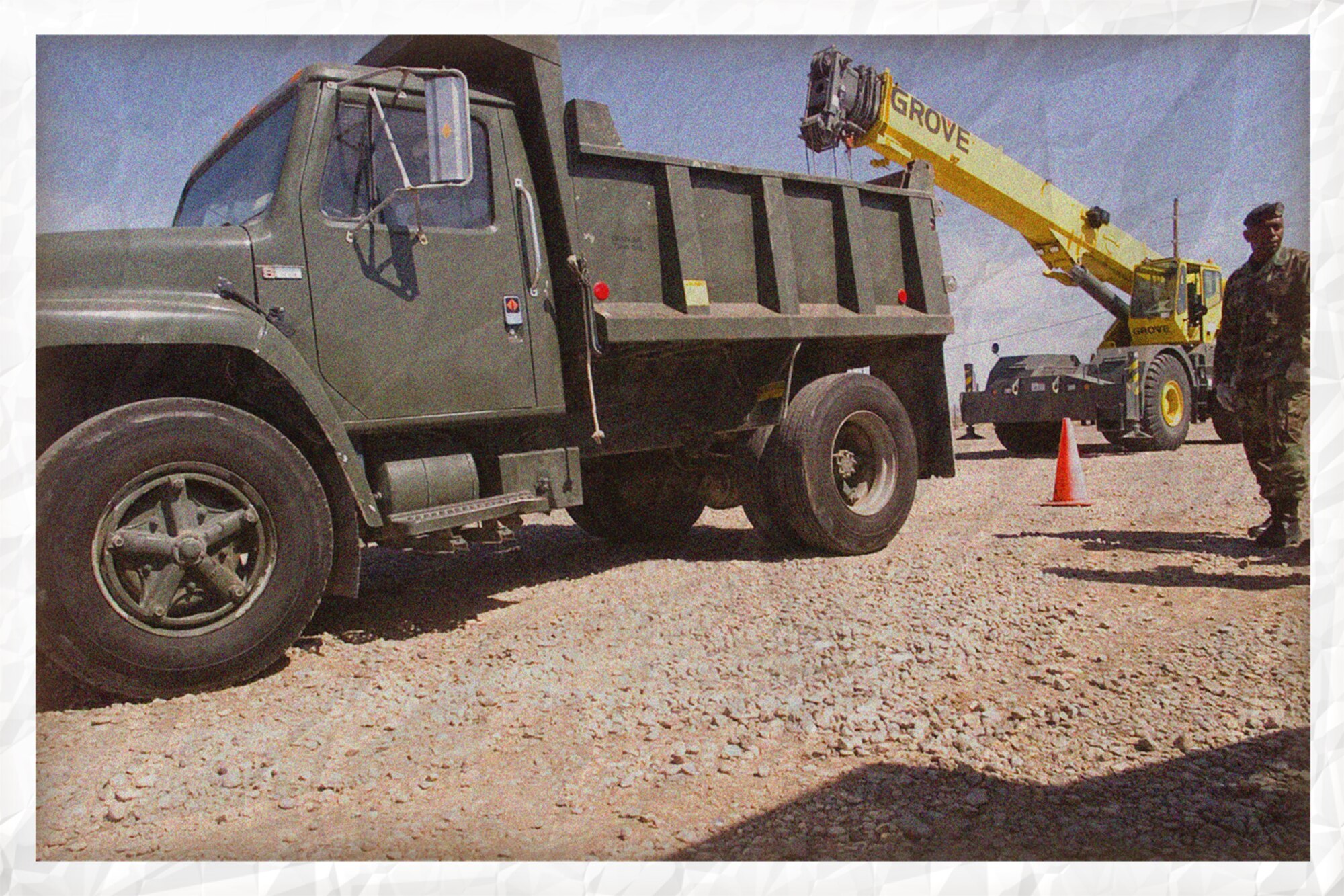 Shudder to Shutter - A heavy vehicle mechanic died when the bed of the 5-ton dump truck he was working on collapsed and trapped him between the bed and the frame of the truck behind the driver's side of the cab. More than one error cost the Airman his life. (photo by Tech. Sgt. Samuel Bendet/composite by David M. Stack)
