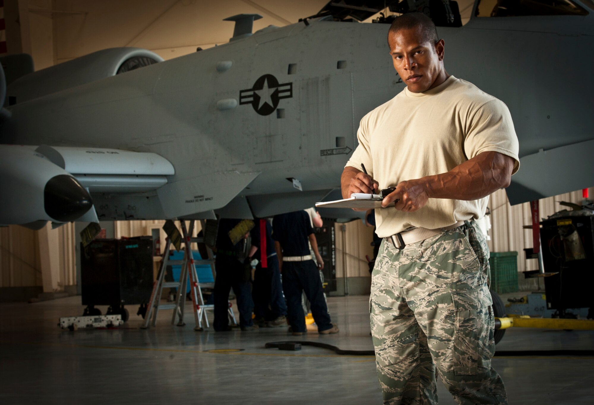 TSgt David Henry gives suggestions on how to lift without injury.

Wear appropriate footwear and clothing. It's a popular trend to wear toe socks, but that's a good way to get your toes broken. Wear loose-fitting, comfortable clothes and shoes that cover your toes.
Do a proper warm-up. It's easy to injure cold muscles, so you need a good 10-minute warm up before getting started. But be sure to warm up the muscles you are going to be using. If you only warm up your upper body, but then go do squats, your leg muscles are still going to be cold and vulnerable to injury.
Use weight collars. These safety devices 
are attached to each end of the bar to keep the weights from slipping off and catapulting the bar.
Use the buddy system. Spotters are a necessity on free weights to ensure you don't get the weight stuck on your neck or chest. But choose your spotter well. If you are 250 pounds and bench-pressing 300, it's probably not wise to have a spotter who weighs only 98 pounds because they aren't likely able to pull the weight off of you if necessary. It's safer to train with someone who's roughly the same weight class and strength as you.
Know your limits. Many people try training to their ego rather than their body. They try to show off and lift more than they are capable of, which is a sure way to end up either hurt or embarrassed when you're having to have people pull weights off of you.
Stay focused. There are plenty of distractions at the gym. But when you're working with heavy metal weights, you have to stay focused or you may end up in the emergency room.

(Photo by TSgt Samuel Bendet)