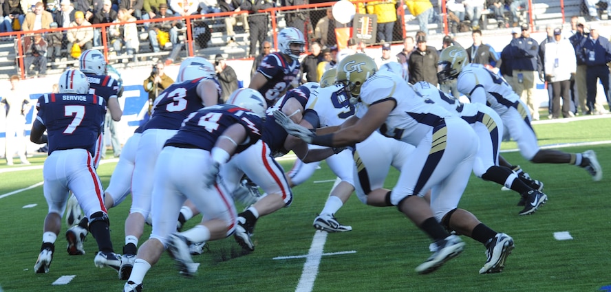 The Air Force Academy Football team attempts to make a first down during the 2010 AdvoCare V100 Independence Bowl at Independence Stadium in Shreveport, La., Dec. 27. The AFA played a total of 21 bowl games with a record of 9-10-1. (U.S. Air Force photo/Airman 1st Class Sean Martin)(Released)
