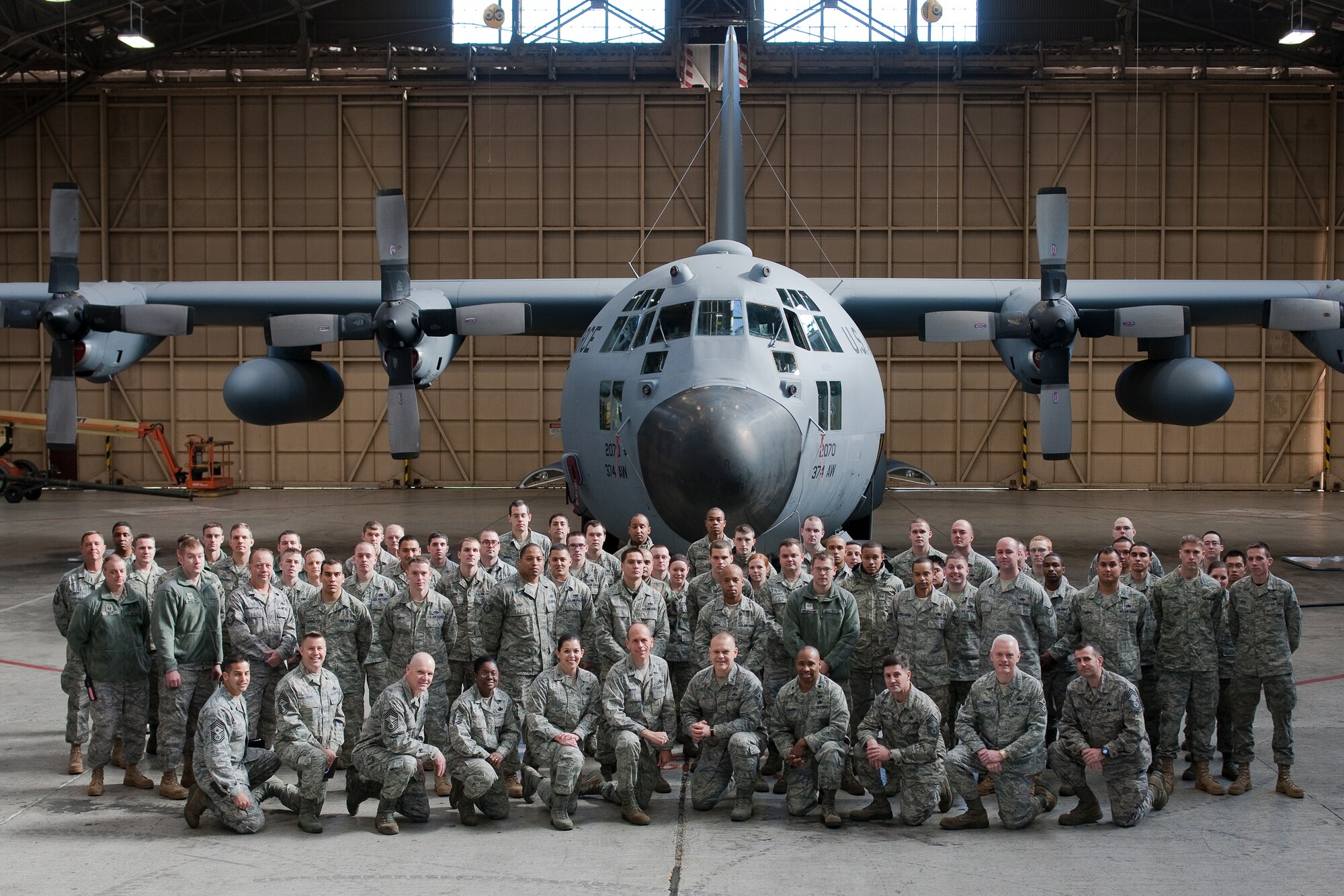YOKOTA AIR BASE, Japan -- Chief Master Sgt. of the Air Force James Roy poses with the 374th Maintenance Group, Dec. 27, at the Isochronal Facility during a base visit. Chief Roy was assigned to Yokota Air Base from August 2005 to May 2007 as Command Chief Master Sergeant, U.S. Forces Japan and 5th Air Force.(U.S. Air Force photo/Osakabe Yasuo)
