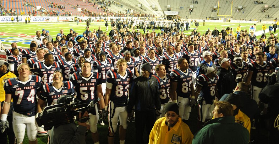 The Air Force Academy Falcons sing their alma mater after defeating the Georgia Tech Yellow Jackets during the 2010 AdvoCare V100 Independence Bowl at Independence Stadium in Shreveport, La., Dec. 27. The Falcons defeated the Yellow Jackets with a score of 14-7. (U.S. Air Force photo/Airman 1st Class Sean Martin)(Released)