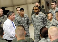 MINOT AIR FORCE BASE, N.D. -- Secretary of the Air Force Michael Donley addresses Airmen from the 5th Bomb Wing about how important their mission is to the safety of our great nation and thanked the group for their service here Dec. 23. He also met with other Air Force Global Strike Command Airmen, as well as base and local community leaders, during a holiday visit on Dec. 23 and 24. The Secretary visited workcenters and facilities showcasing the Air Force's only dual-mission bomber and ICBM base, and had the chance to share a holiday meal with base and local leaders. (U.S. Air Force photo/Staff Sgt. Keith Ballard)