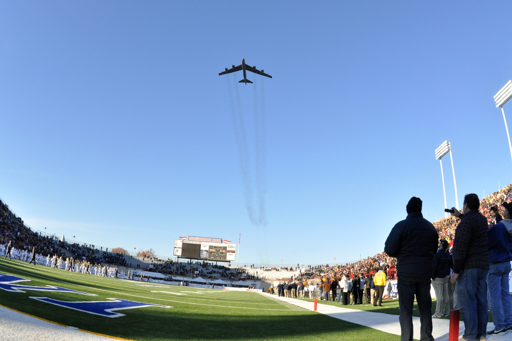 A B-52 Stratofortress provides a flyover for the AdvoCare V100 Independence Bowl Dec. 27 in Shreveport, La. The B-52, from the 917th Wing at Barksdale Air Force Base, was flown by a blended crew of active duty from the 2d Bomb Wing's 11th Bomb Squadron and Air Force Reservists from the 93rd Bomb Squadron. The U.S. Air Force Academy Falcons defeated the Georgia Tech Yellow Jackets in the Independence Bowl 14-7. (U.S. Air Force photo/Tech. Sgt. Jeffrey Walston)
