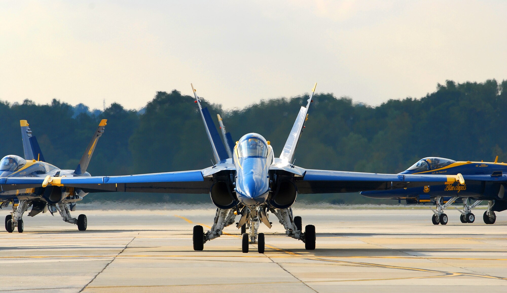 Blue Angels #1 leads the rest of the team toward the Dobbins Air Reserve Base ramp shortly after landing Oct. 14.  The Blue Angels will fly their exciting demonstration during the Wings Over Atlanta 2010 Air Show.  (U.S. Air Force photo/ Brad Fallin)
