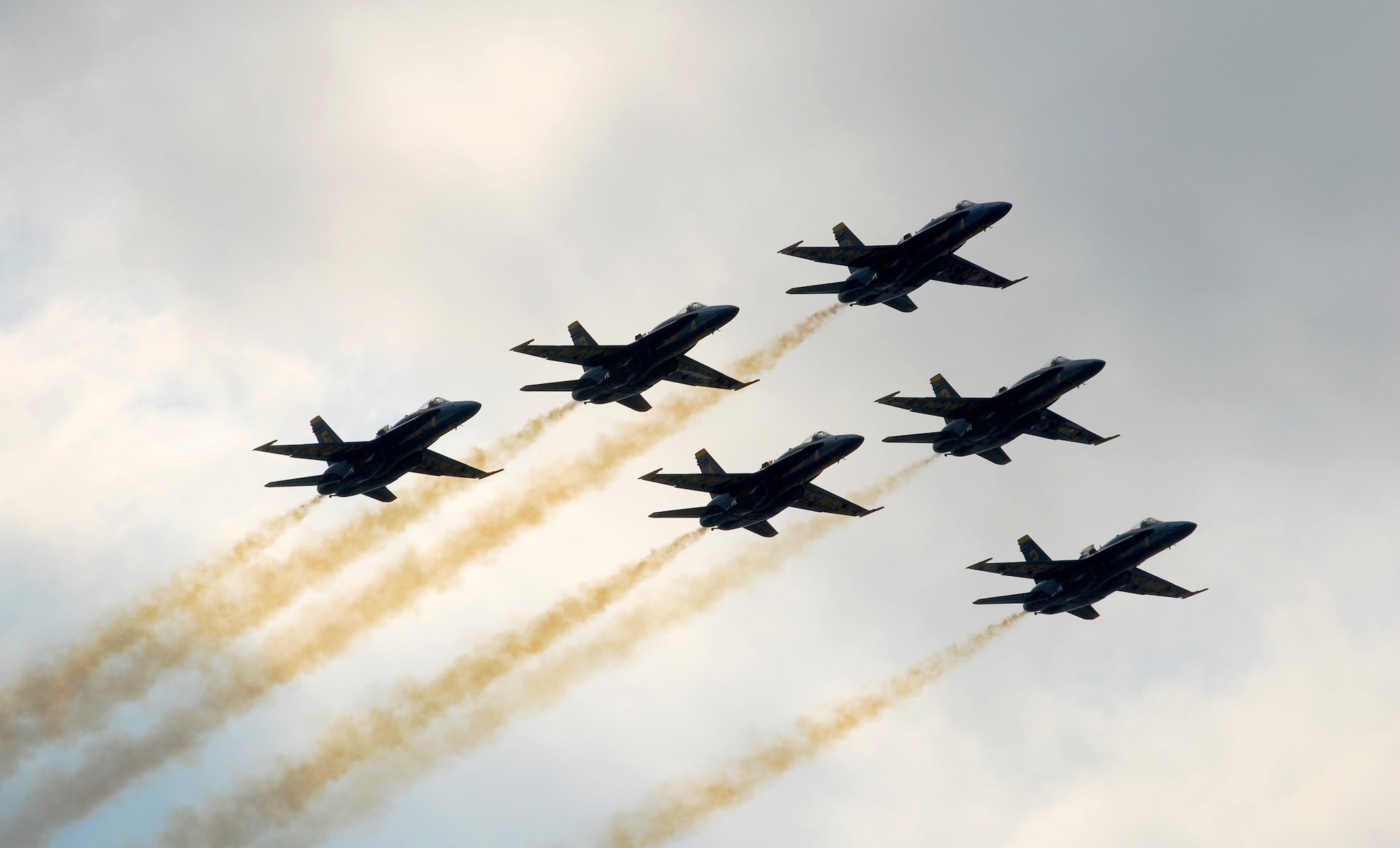 The six Blue Angels F/A-18 Hornet aircraft arrive over the Dobbins Air Reserve Base runway Oct. 14.  The Blue Angels will fly their exciting demonstration during the Wings Over Atlanta 2010 Air Show.  (U.S. Air Force photo/ Brad Fallin)