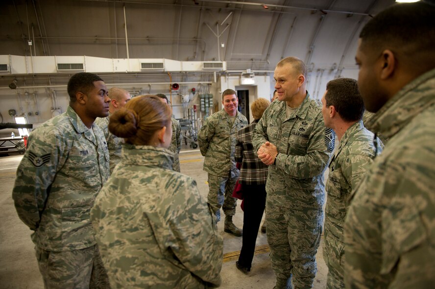 Chief Master Sgt. of the Air Force James Roy talks with maintainers from the 14 Aircraft Maintenance Unit at Misawa Air Base, Japan; Dec. 28, 2010. Chief Roy visited a hardened aircraft shelter with Col. Michael Rothstein, 35th Fighter Wing commander, to get an up-close look at the 35th FW mission and the F-16 Fighting Falcon. (U.S. Air Force photo by Staff Sgt. Samuel Morse/Released)