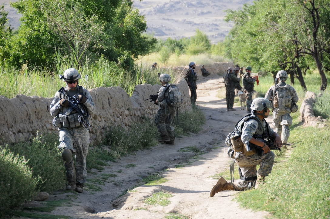 U.S. Army soldiers pull security near Forward Operating Base Baylough in Zabul province, Afghanistan, June 18, 2010. The soldiers are assigned to Company D, 1st Battalion, 4th Infantry Regiment.