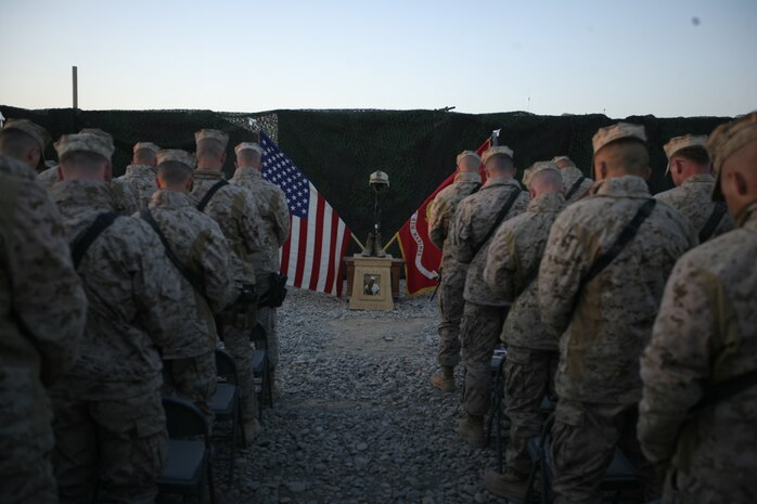 Marines of 2nd Battalion, 6th Marine Regiment, Regimental Combat Team 1, pay their final respects to their fallen brother, Lance Cpl. Lucus Scott, in Camp Dwyer, Afghanistan, Dec. 28, 2010. The 2nd Battalion, 6th Marine Regiment is deployed in Helmand province while in support of International Security Assistance Force.