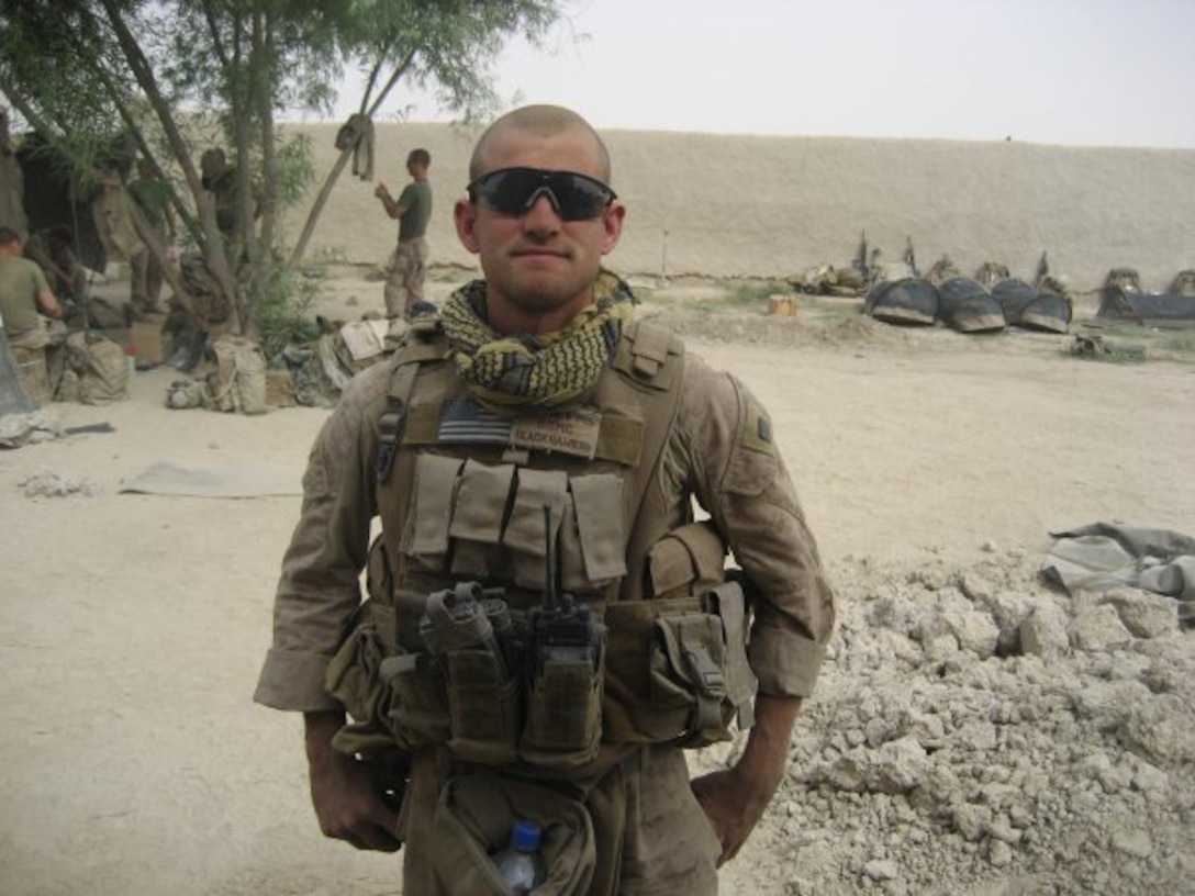 Cpl. Paul Nee, then a rifleman with 1st Battalion, 6th Marine Regiment, 2nd Marine Division, currently a patient with Wounded Warrior Battalion - East, poses for a shot inside a base camp in the village of Garmsir in Helmand province, Afghanistan, 2008. This would be Nee's last deployment as following his battalions' return home he would be diagnosed with Post Traumatic Stress Disorder.