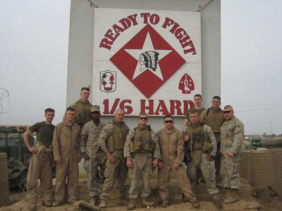 Marines and corpsman of third squad, second platoon, Company B, 1st Battalion, 6th Marine Regiment, 2nd Marine Division, stand inside base camp in Ramadi, Iraq, 2006. Cpl. Paul Nee, then a rifleman with 1st Battalion, 6th Marine Regiment, 2nd Marine Division, currently a patient with Wounded Warrior Battalion - East, was on his first of two combat deployments before diagnosed with Post Traumatic Stress Disorder.