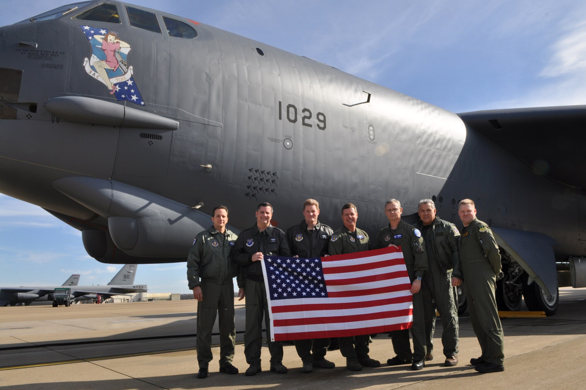 The crew of the B-52 Stratofortress, which belongs to the 917th Wing’s 93rd Bomb Squadron, poses for a photo before embarking on a training mission that will eventually cumulate with a flyover at the Independence Bowl in Shreveport La., Dec. 27, 2010. The jet was flown by a Total Force crew of Regular Air Force members from the 2nd Bomb Wing's 11th Bomb Squadron and Air Force Reserve members from 93rd BS. The crew members were Lt. Col. Denis Heinz, 93rd Bomb Squadron, Maj. Sam Smith, 11th Bomb Squadron, Lt. Col. Chris Talbot, 93rd BS, Col. Keith Schultz, 917th Operations Group, commander, Lt. Col. Joe Jones, 93rd BS, commander, Mr. Jack Andres, Vice Chairman of Independence Bowl, and Maj. Timothy Pierce, from the 11th BS. The U.S. Air Force Academy Falcons defeated the Georgia Tech Yellow Jackets in the Independence Bowl 14-7. (U.S. Air Force photo/Tech. Sgt. Jeff Walston)