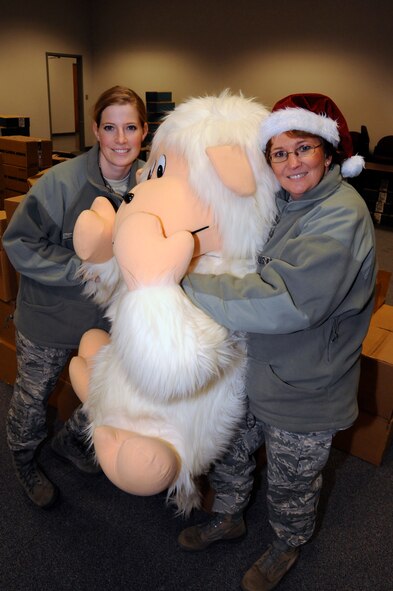 Tech. Sgt. Niki Adams and Master Sgt. Vickie Chambers, 442nd Airman and Family Readiness, work at the Christmas store, Dec. 3, 2010. The Christmas store received more than $50,000 worth of items as donations, which were then available for Citizen Airmen and their families. The 442nd Fighter Wing is an Air Force Reserve unit at Whiteman Air Force Base, Mo. (U.S. Air Force photo/Tech. Sgt. Tom Talbert)