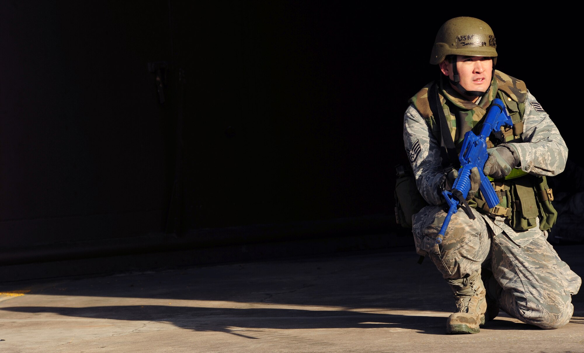 Staff Sgt. Jonathan Dillon takes a defensive stance after a simulated attack Nov. 20, 2010, during a practical application portion of Silver Flag at Ramstein Air Base, Germany. Silver Flag is a weeklong, ongoing training program that includes Airmen from various duty stations around the world. Members of NATO forces have also been invited to attend. Silver Flag combines classroom and practical application exercises to prepare Airmen for deployment. Sergeant Dillon is assigned to the 442nd Civil Engineer Squadron at Whiteman Air Force Base, Mo. (U.S. Air Force photo/Tech. Sgt. Jocelyn Rich)
