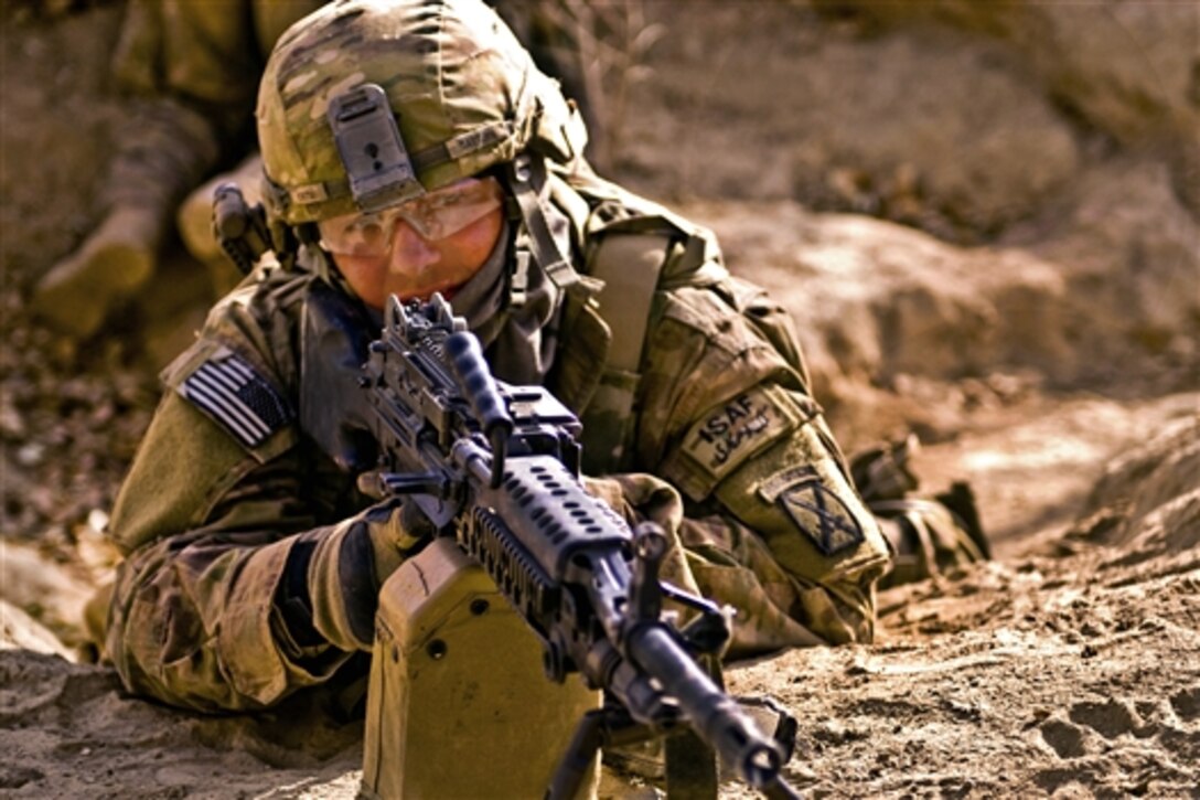 U.S. Army Spc. Paul M. Cattorn provides security for Afghan National Security Forces on day two of a six-day dismounted operation in Logar province, Afghanistan, Dec. 20, 2010. Cattorn is assigned to the 10th Mountain Division's Company C, 2nd Battalion, 30th Infantry Regiment, 4th Brigade Combat Team, Task Force Storm. 