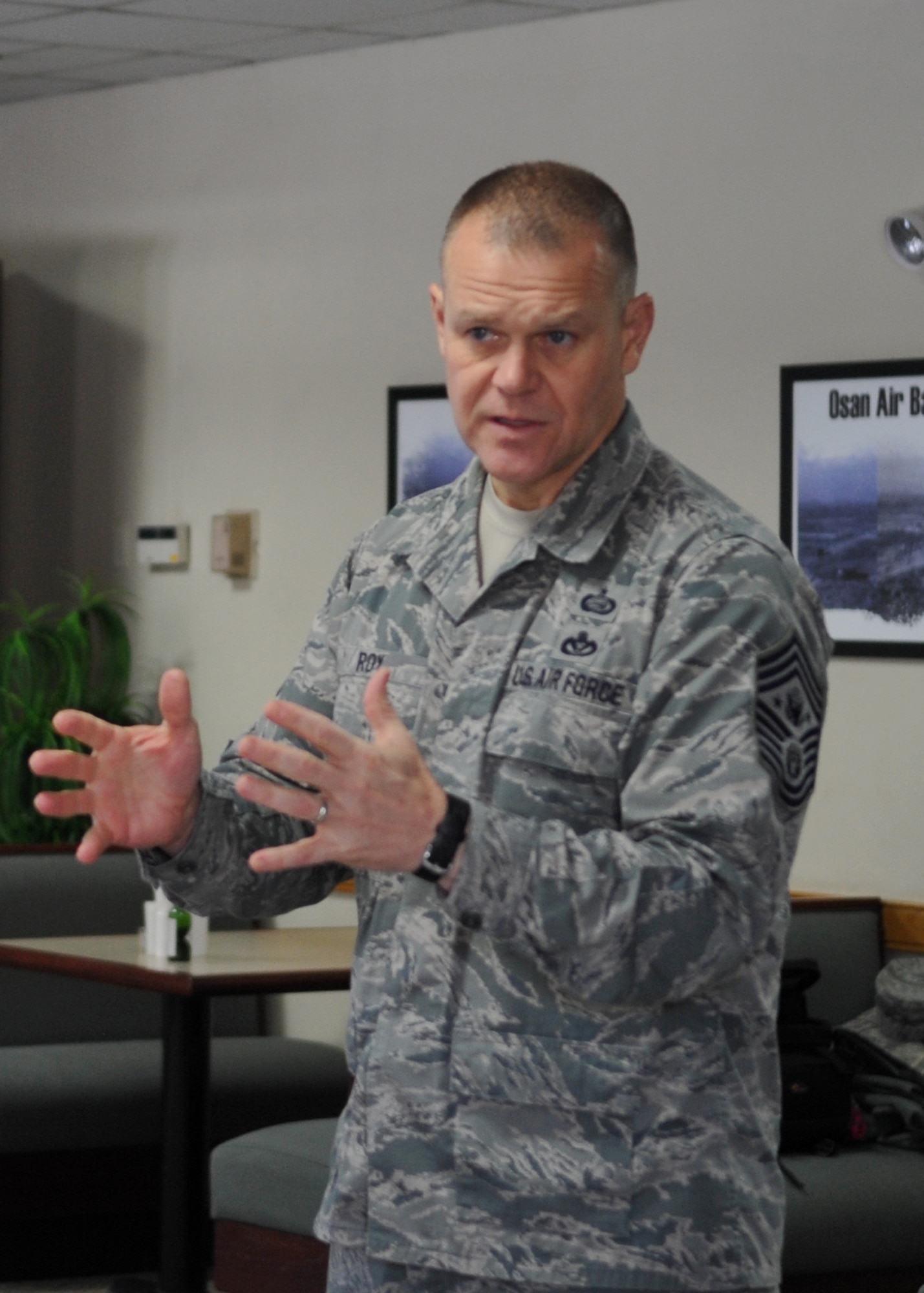 Chief Master Sgt. of the Air Force James Roy addresses 51st Fighter Wing Airmen, Dec. 31, 2010, at Osan Air Base, Republic of Korea. Chief Roy discussed issues regarding enlisted perspective and key issues across the Air Force. (U.S. Air Force photo/Senior Airman Evelyn Chavez)