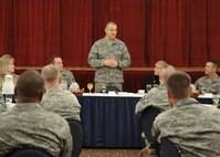Chief Master Sgt. of the Air Force James Roy addresses Chiefs' group members and spouses, Dec. 31, 2010, at Osan Air Base, Republic of Korea. Chief Roy discussed issues regarding enlisted perspective and key issues across the Air Force. (U.S. Air Force photo/Senior Airman Evelyn Chavez)