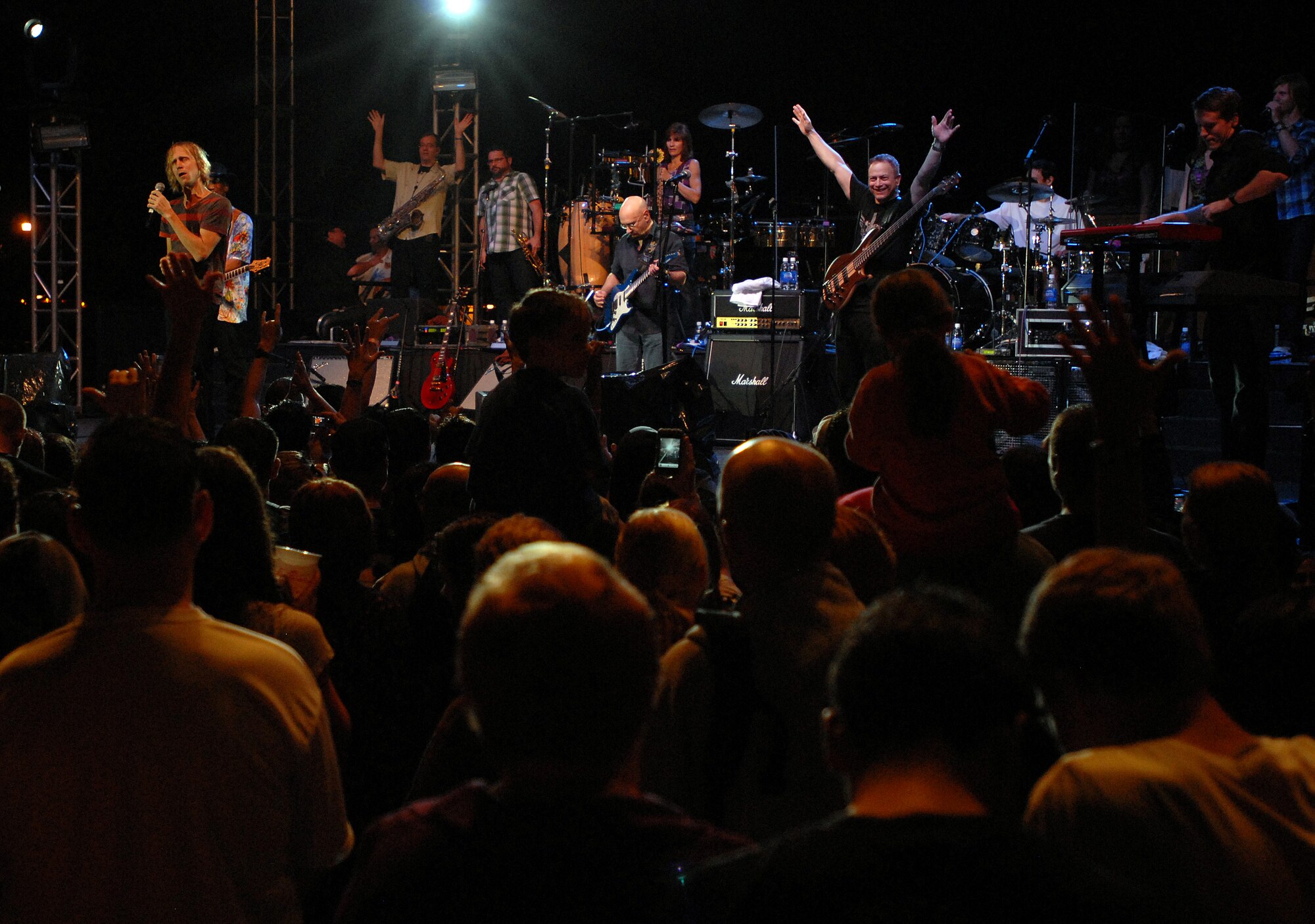 HICKAM AIR FORCE BASE, Hawaii -- Gary Sinise and the Lt. Dan Band performs for more than 6,000 Hickam and Pearl Harbor service members at Freedom Tower Jan. 30. The Lt. Dan Band covers everything from Springsteen to Linkin Park, from Aretha Franklin to Jimi Hendrix.  The concert is sponsored by USO and Triwest. The band is known for a character Sinise portrayed in the 1994 Academy Award winning film, Forrest Gump. Sinise received an Oscar nominated for Best Supporting Actor. (U.S. Air Force photo/Staff Sgt. Mike Meares)