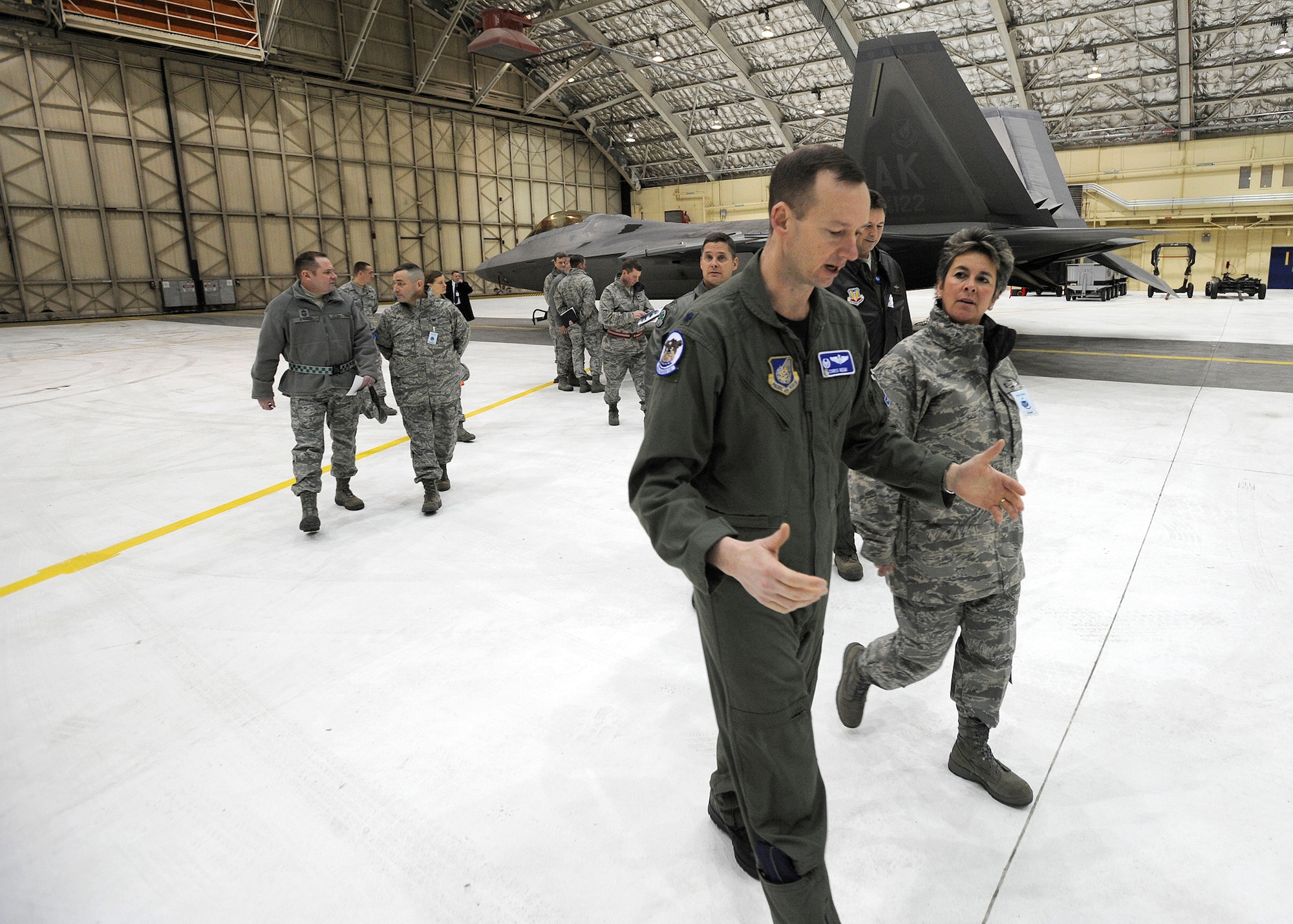ELMENDORF AIR FORCE BASE, Alaska -- Lt. Col. Christopher Niemi,  525th Fighter Squadron commander, briefs  Maj. Gen. Anita Gallentine on the capabilities of the F-22 Raptor during the  Installation Excellence team’s tour of the facility  Jan. 27. Maj. Gen. Gallentine and the Installation Excellence team were here to evaluate Elmendorf as one of two finalists for the Air Force Installation of the Year award. (Air Force photo by Senior Airman Matt Coleman-Foster)